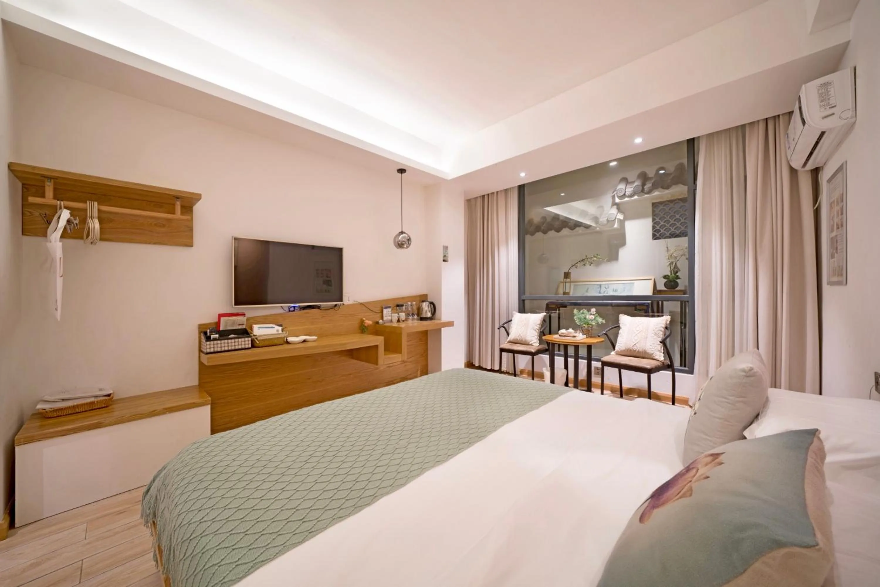 Photo of the whole room, Bed in Ancient Street No.5 Youth Chic Hotel