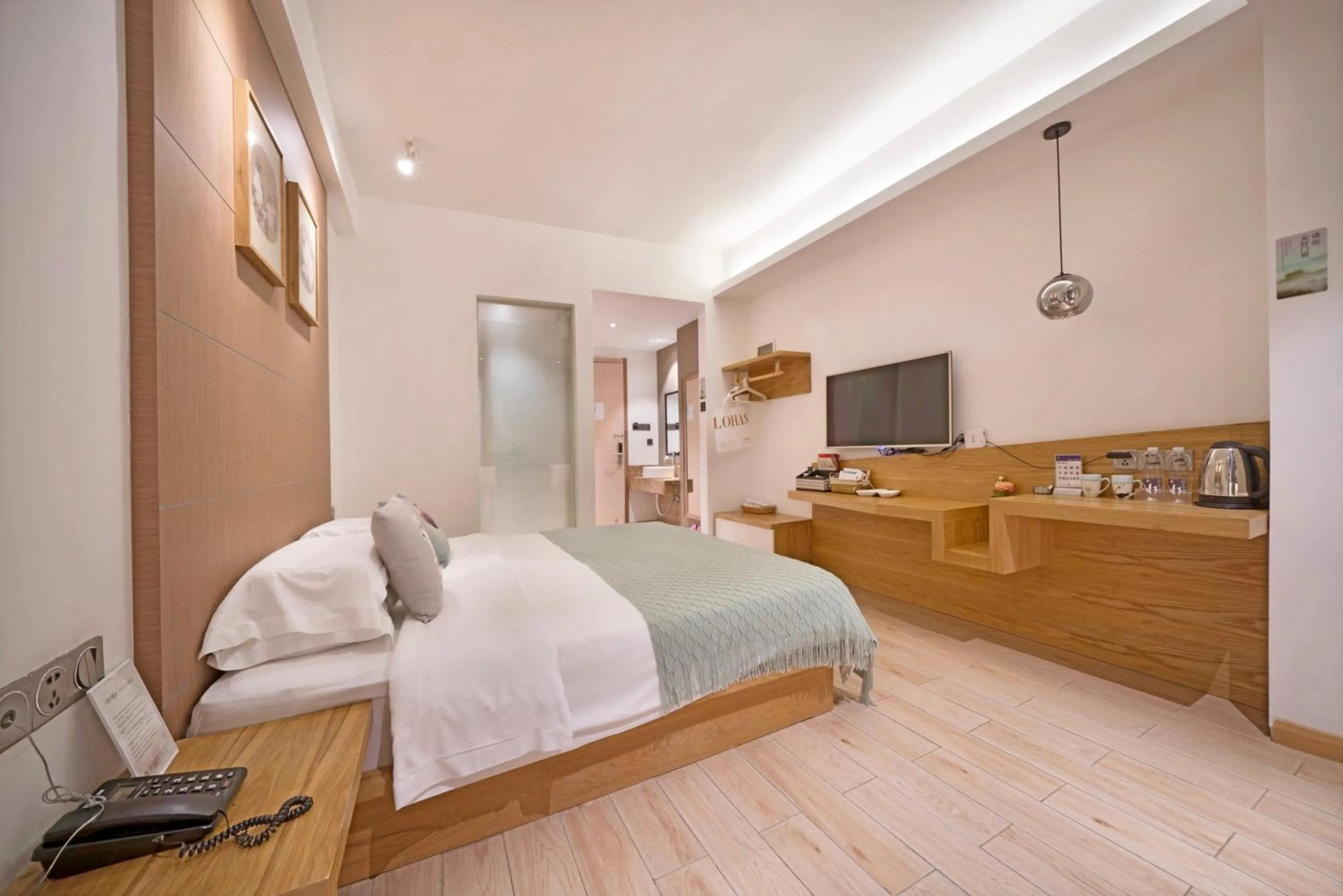 Photo of the whole room, Bed in Ancient Street No.5 Youth Chic Hotel