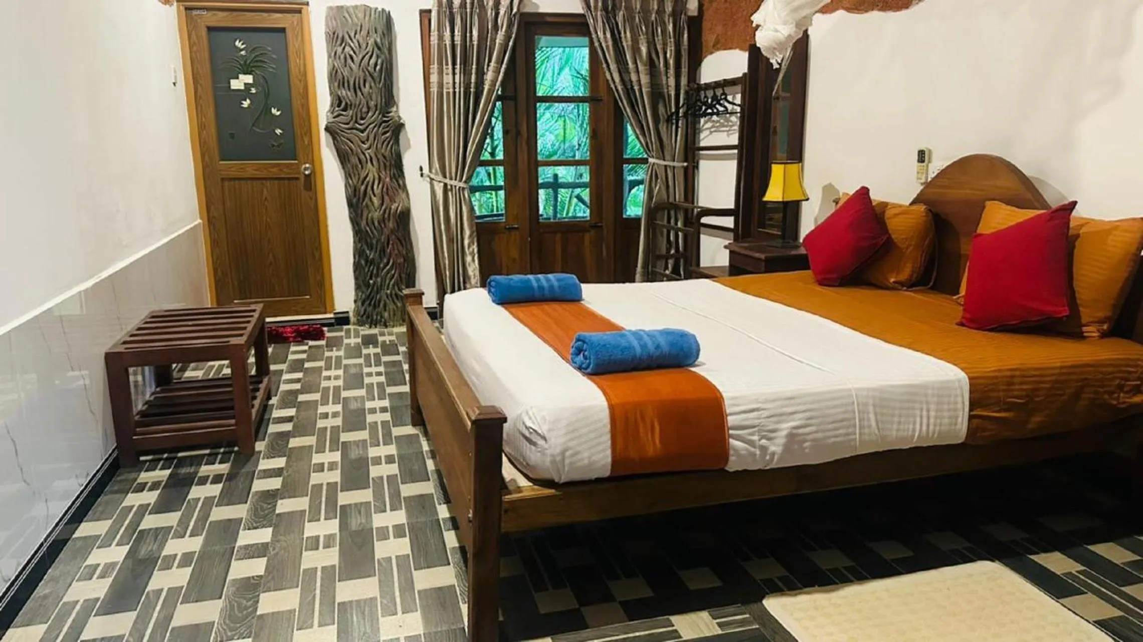 Bed in Sigiri Heritage Villa