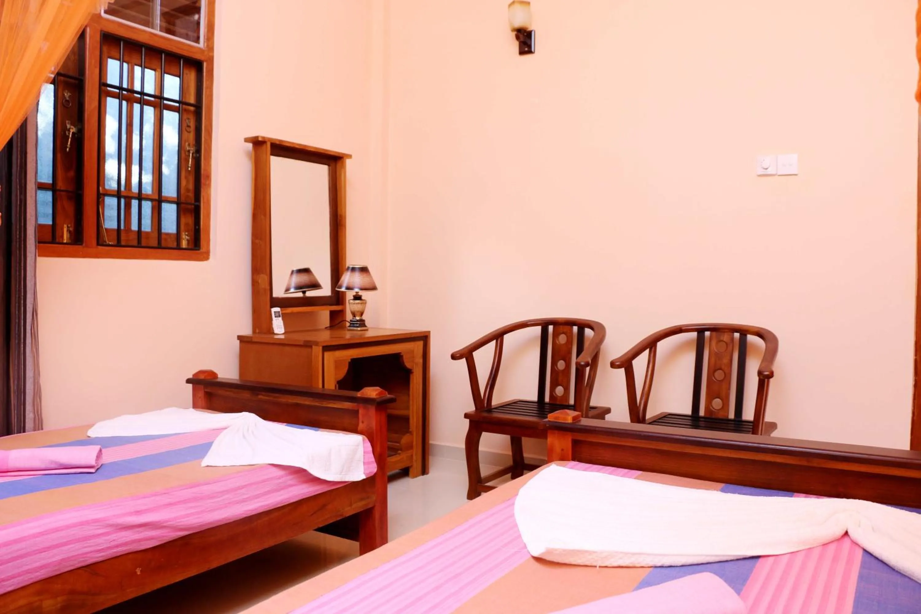 Photo of the whole room, Bed in The Cool Nest Yala Hotel