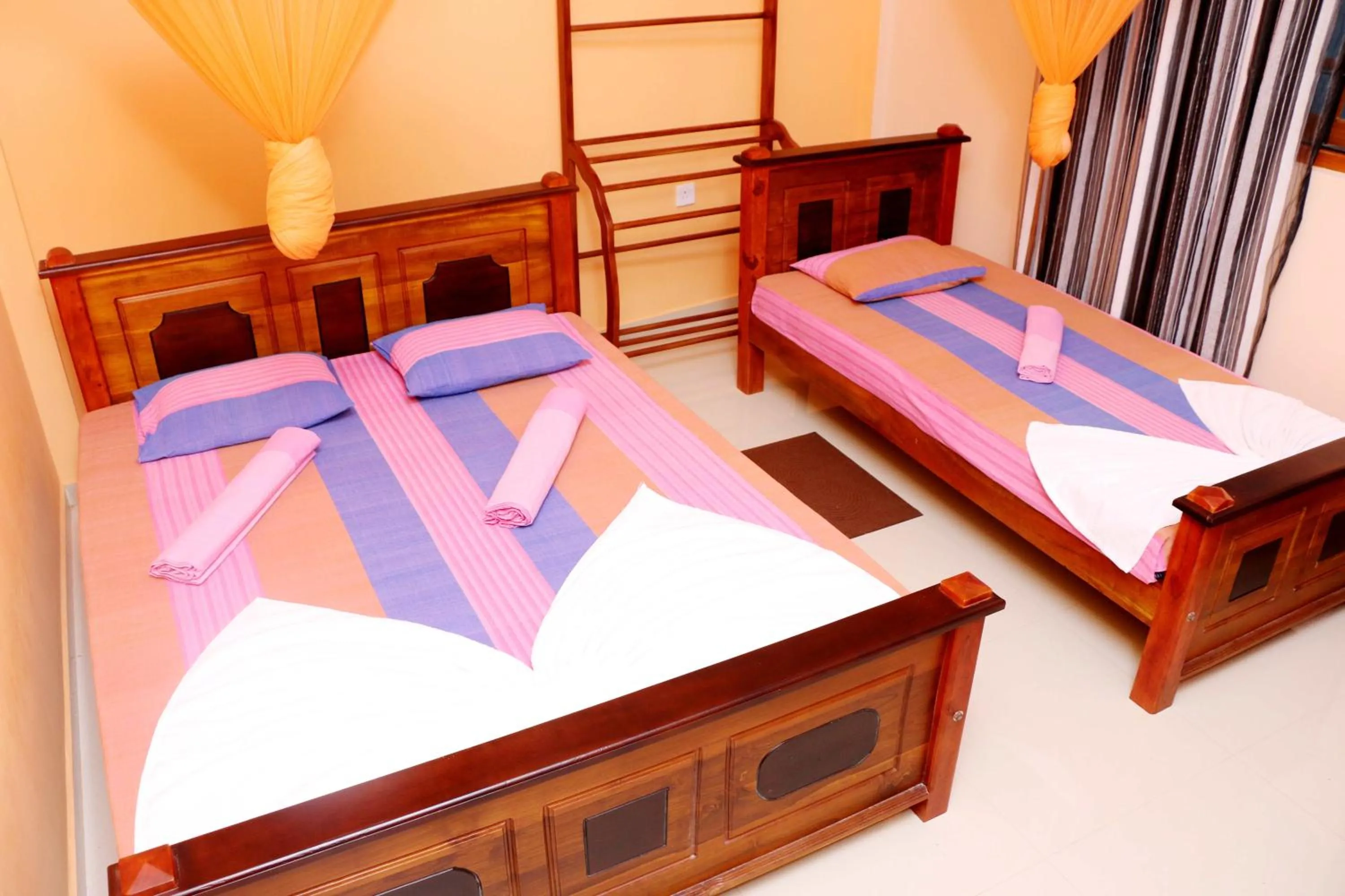 Photo of the whole room, Bed in The Cool Nest Yala Hotel
