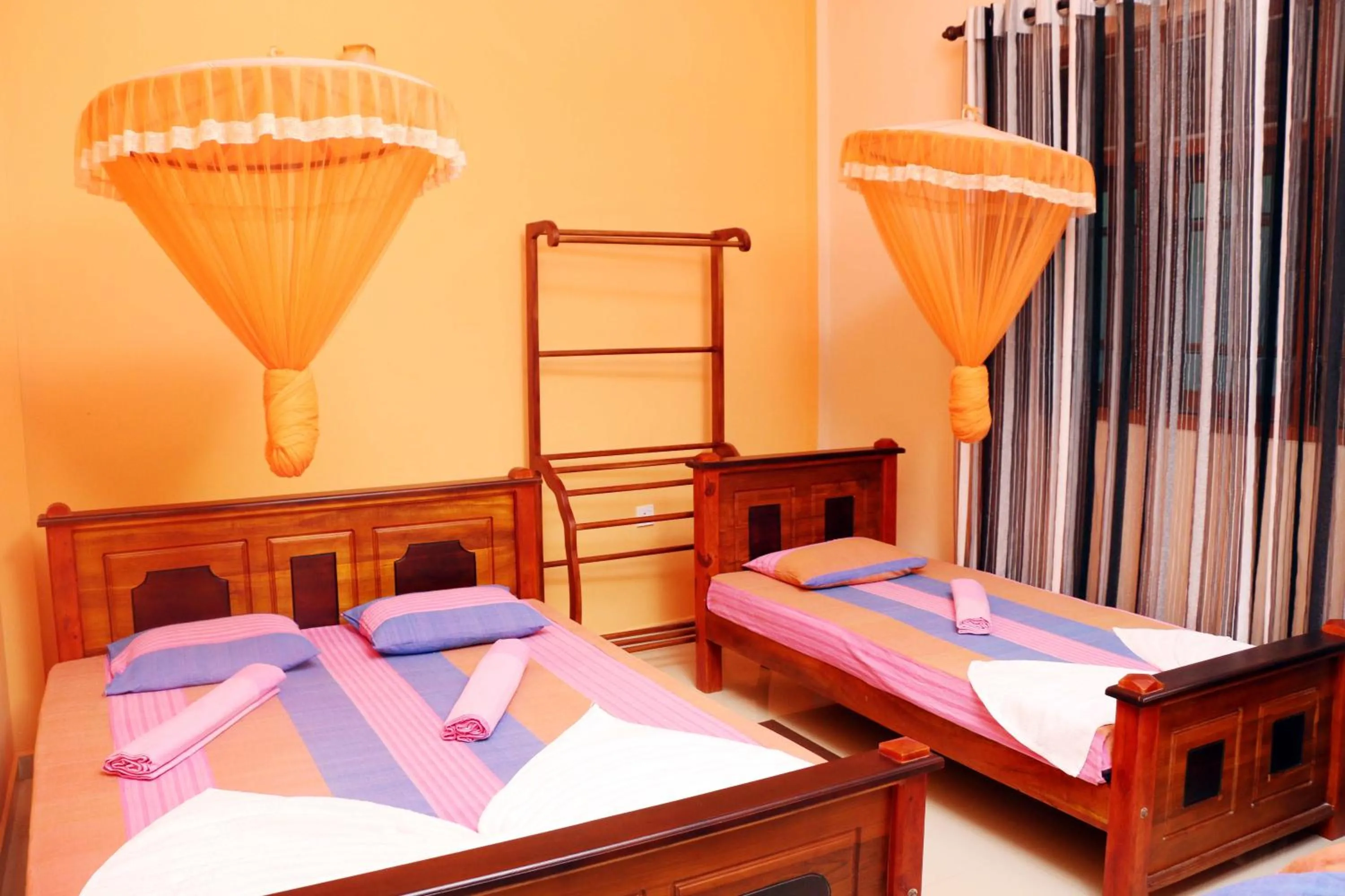 Photo of the whole room, Bed in The Cool Nest Yala Hotel