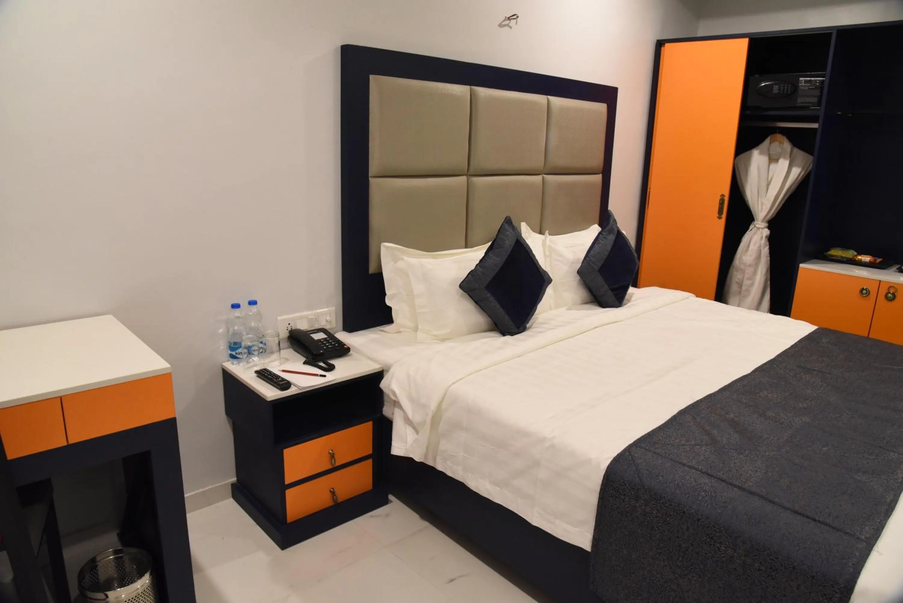 Bedroom, Bed in Regenta Inn Vadodara, 500m from Railway Station