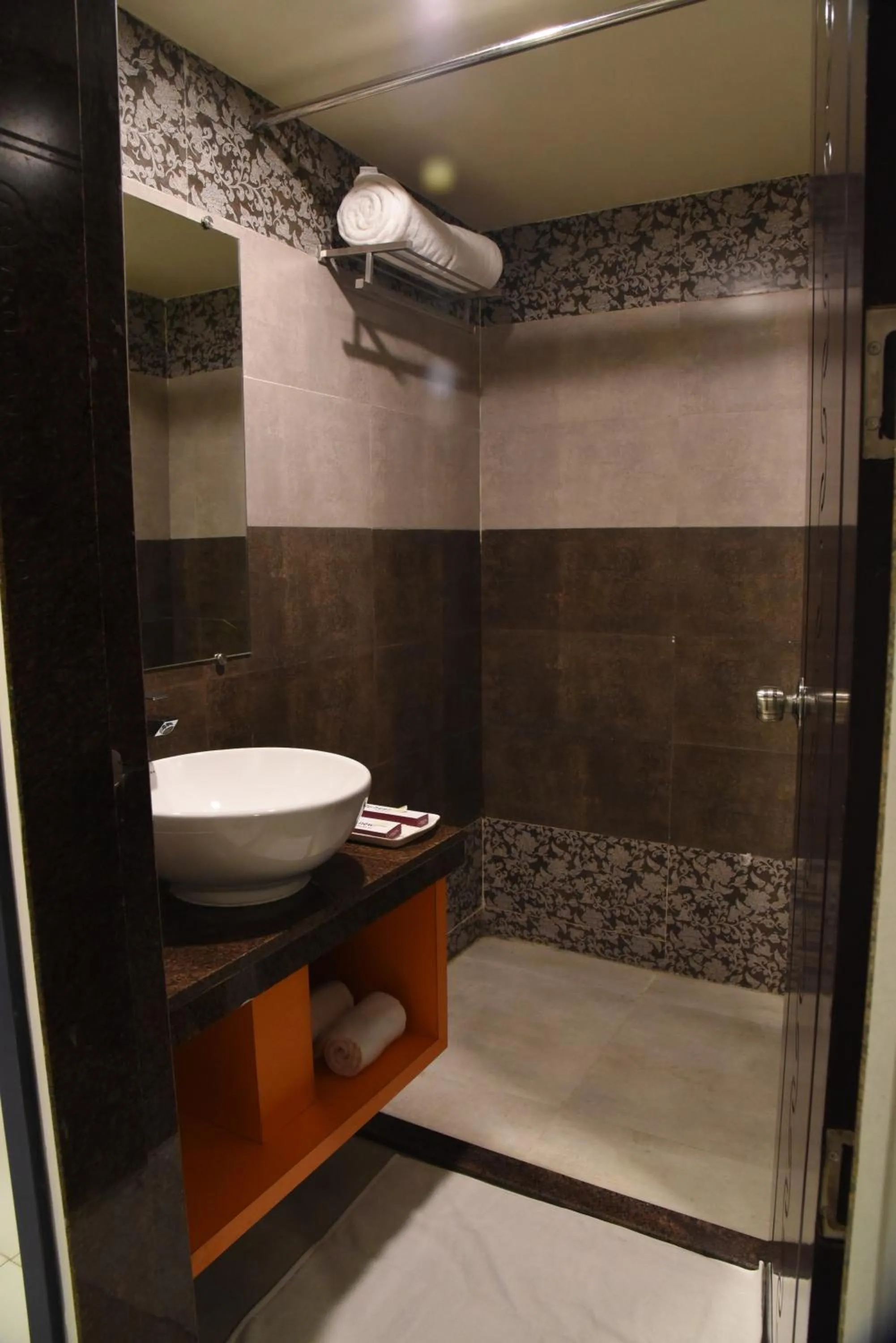 Bathroom in Regenta Inn Vadodara, 500m from Railway Station