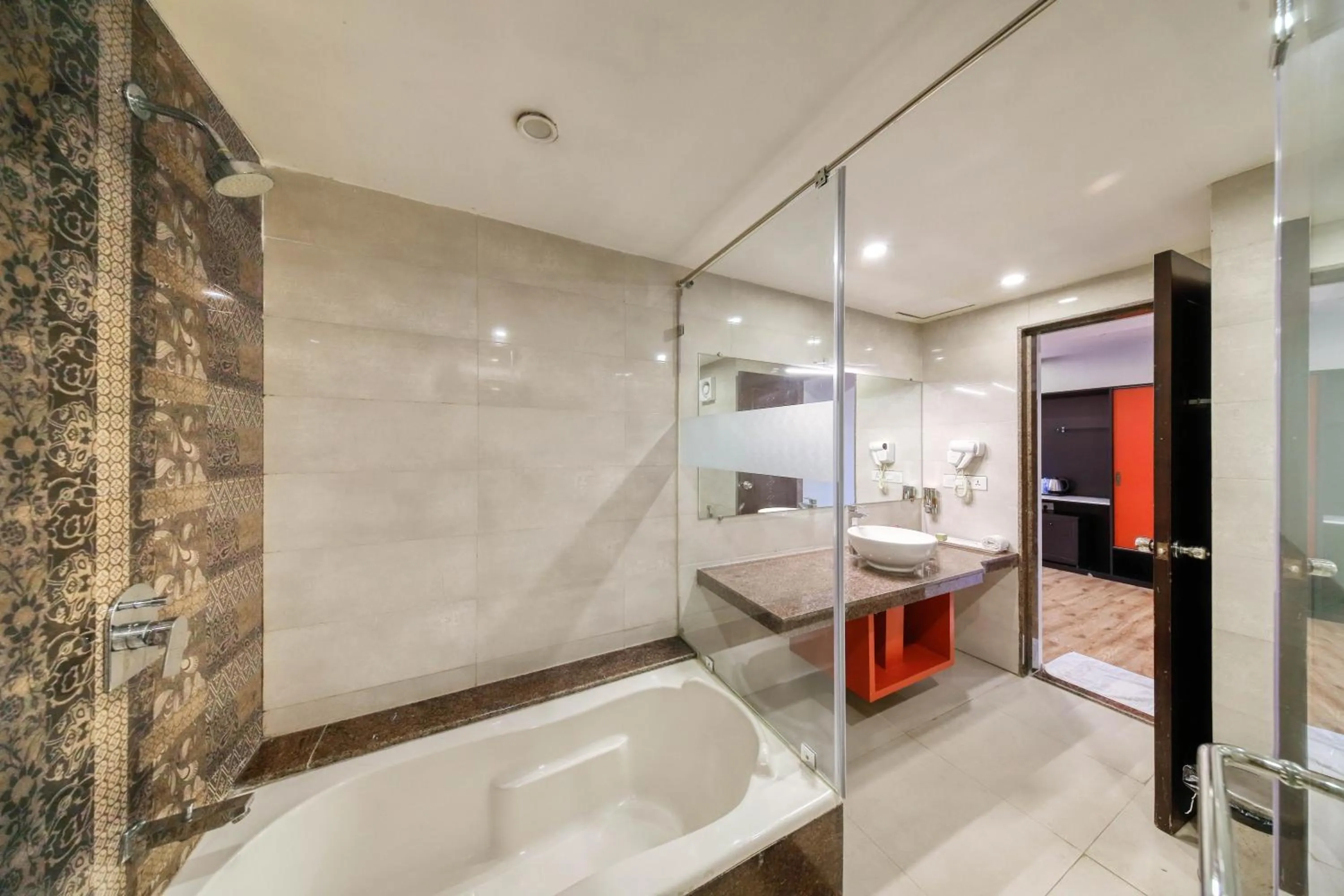 Bath in Regenta Inn Vadodara, 500m from Railway Station