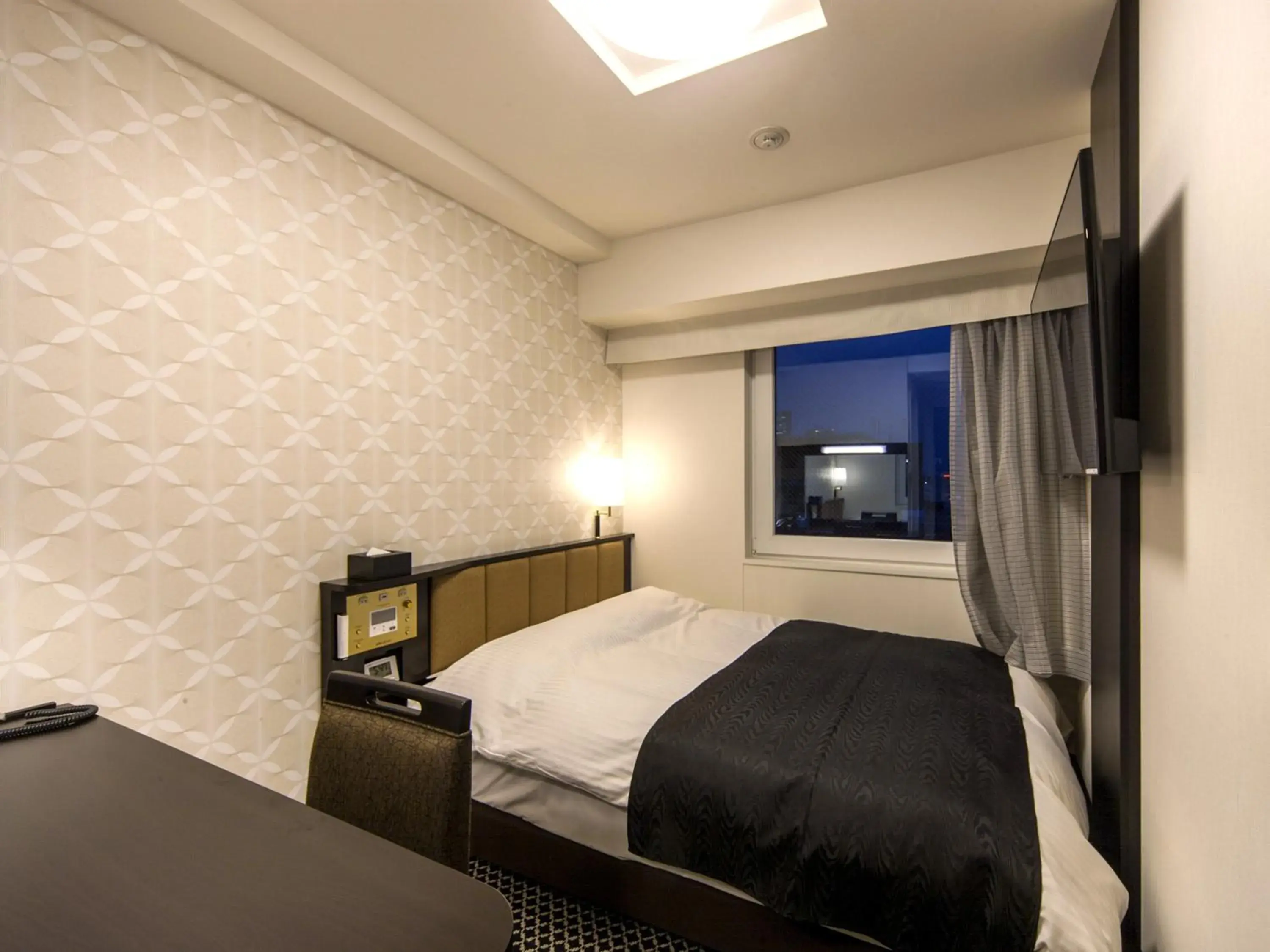 Bed in APA Hotel Higashi Shinjuku Kabukicho Higashi Bed in APA Hotel Higashi Shinjuku Kabukicho Higashi