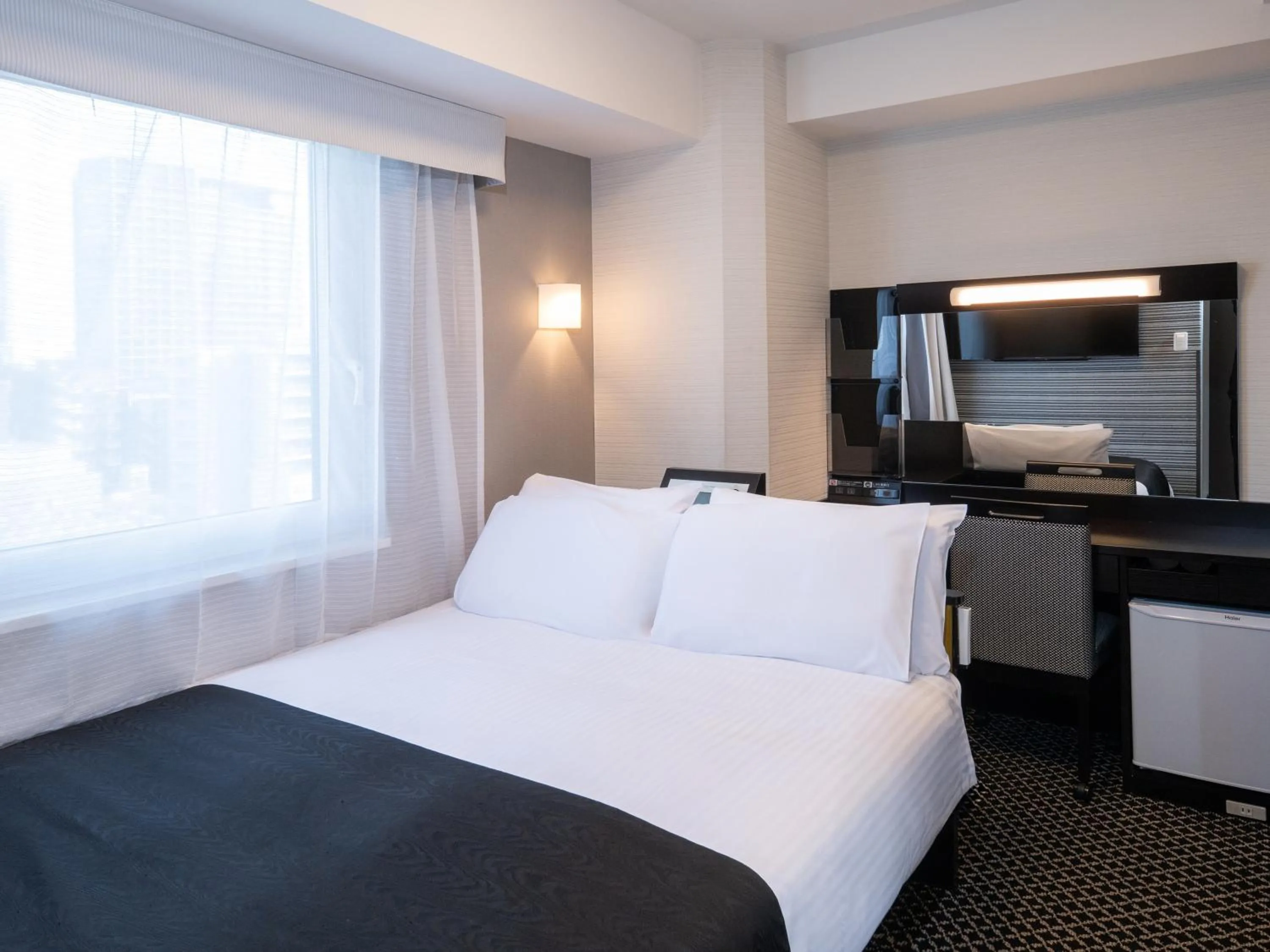 Bed in APA Hotel Higashi Shinjuku Kabukicho Higashi