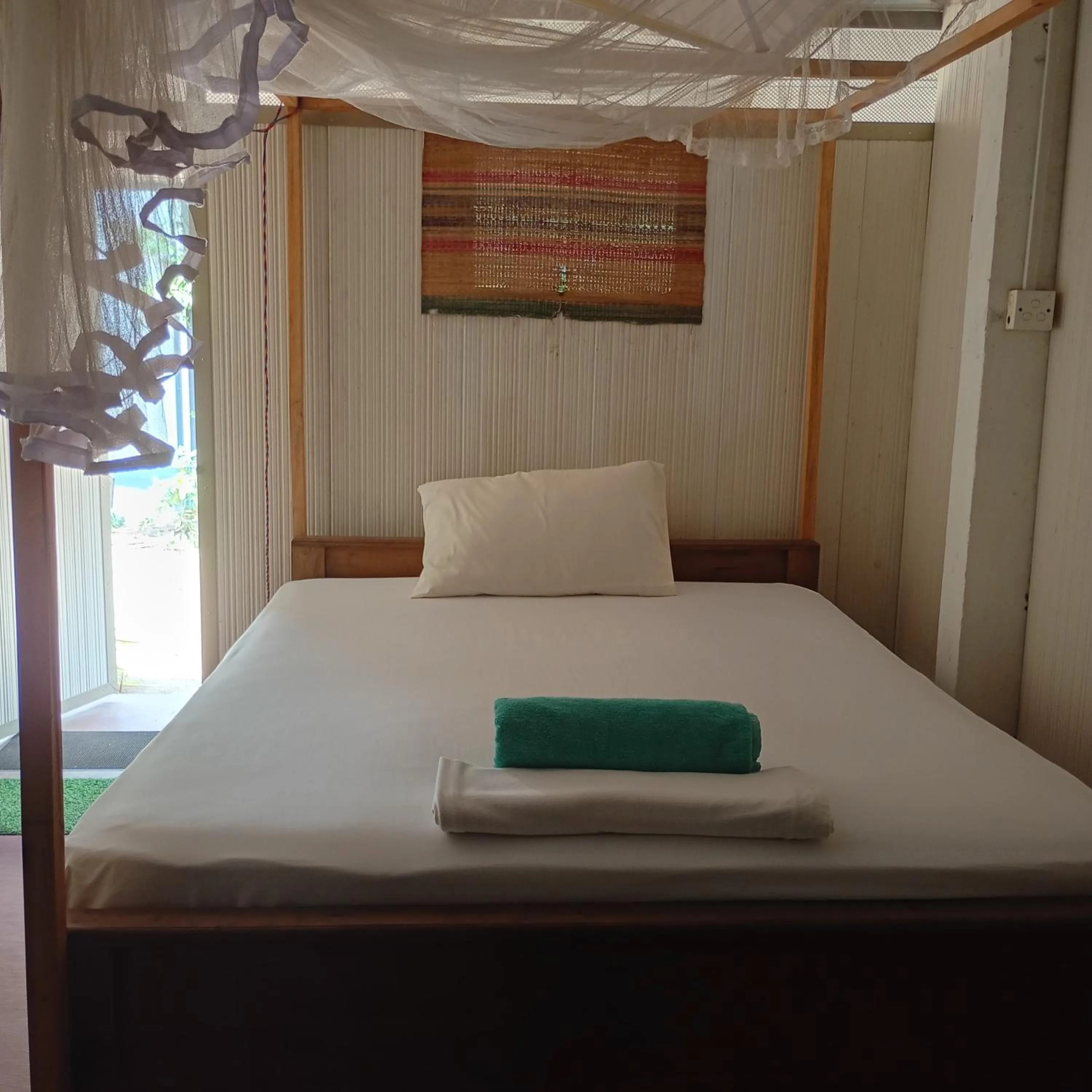 Bed in Salt Bay Kite and Dive Resort