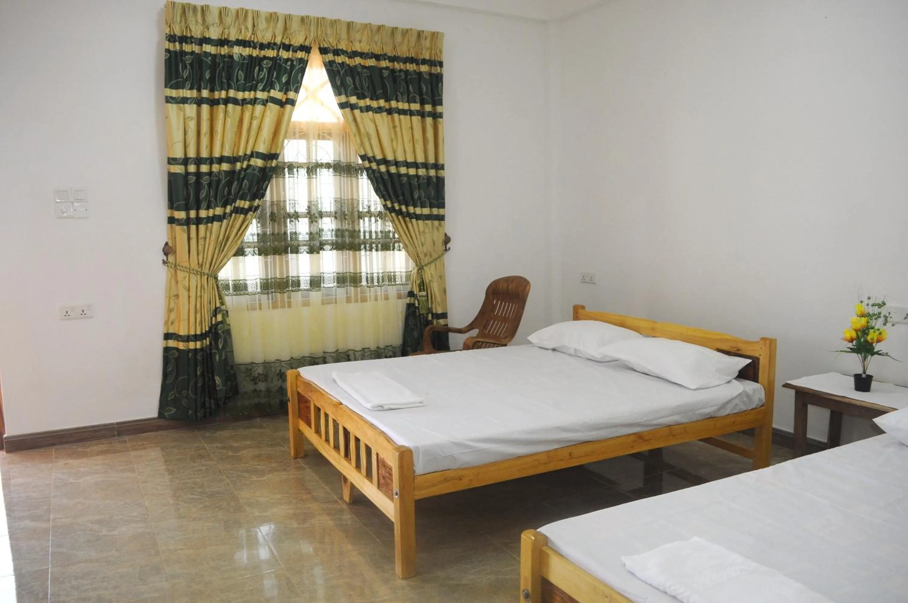Bed in Nilaveli Star View Hotel