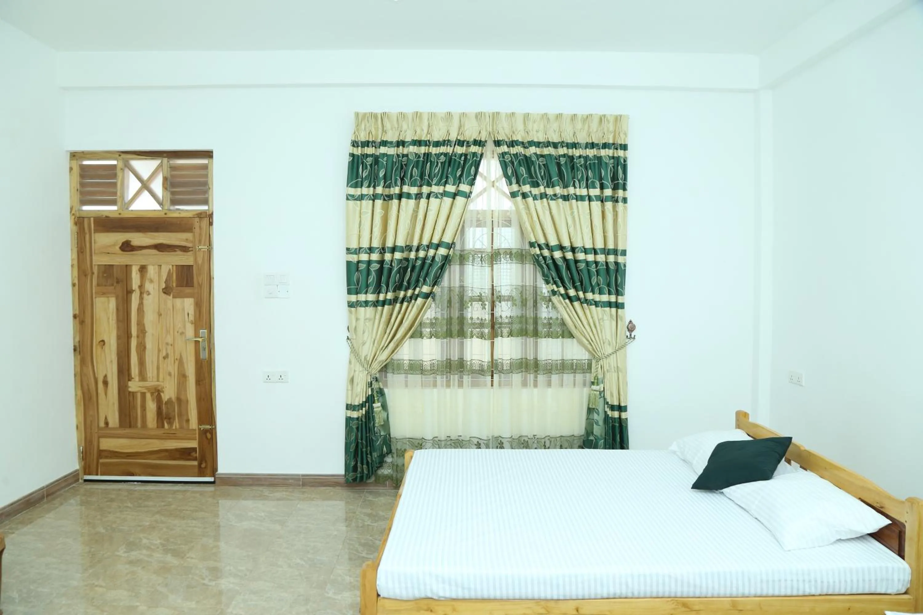Bed in Nilaveli Star View Hotel