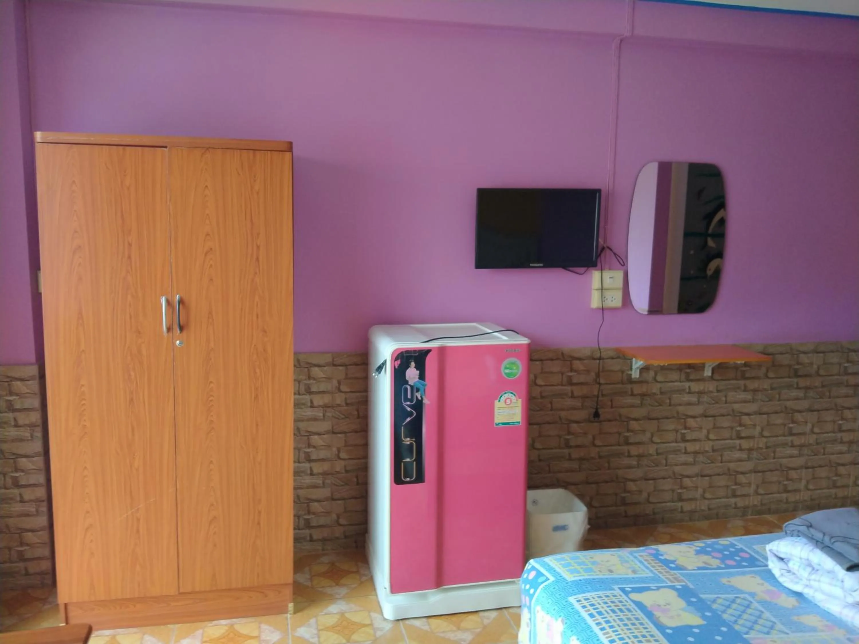 Bed in Rueangsrisiri Guesthouse 2