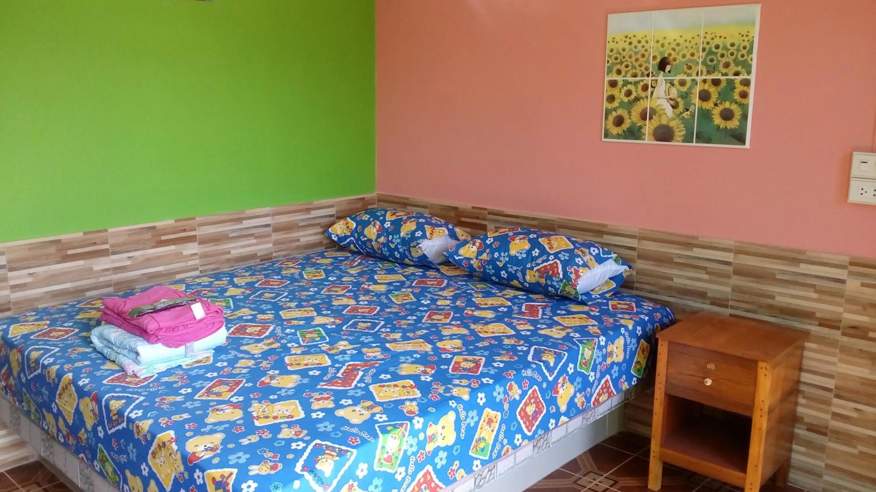 Bed in Rueangsrisiri Guesthouse 2