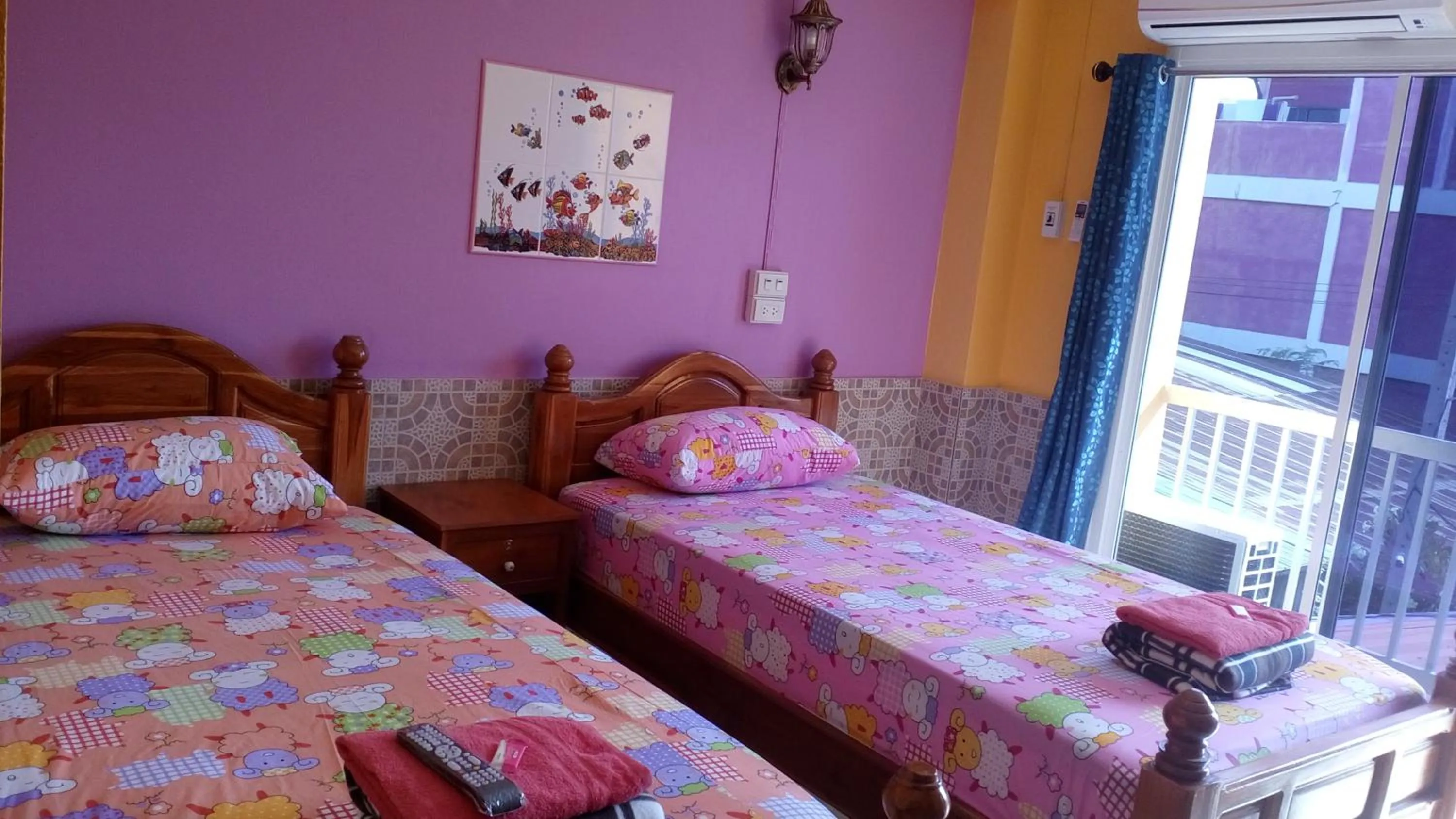 Bed in Rueangsrisiri Guesthouse 2