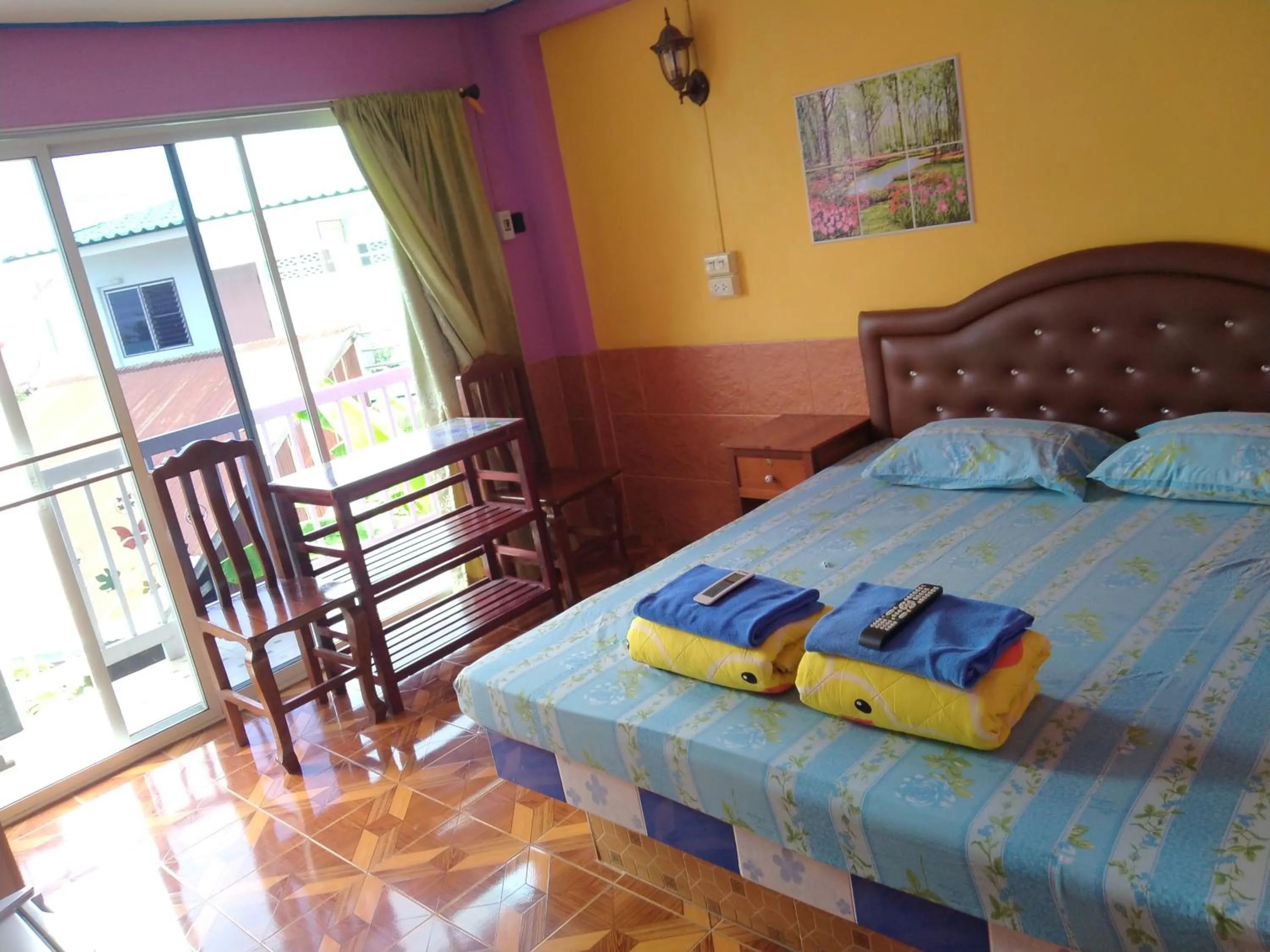 Bed in Rueangsrisiri Guesthouse 2