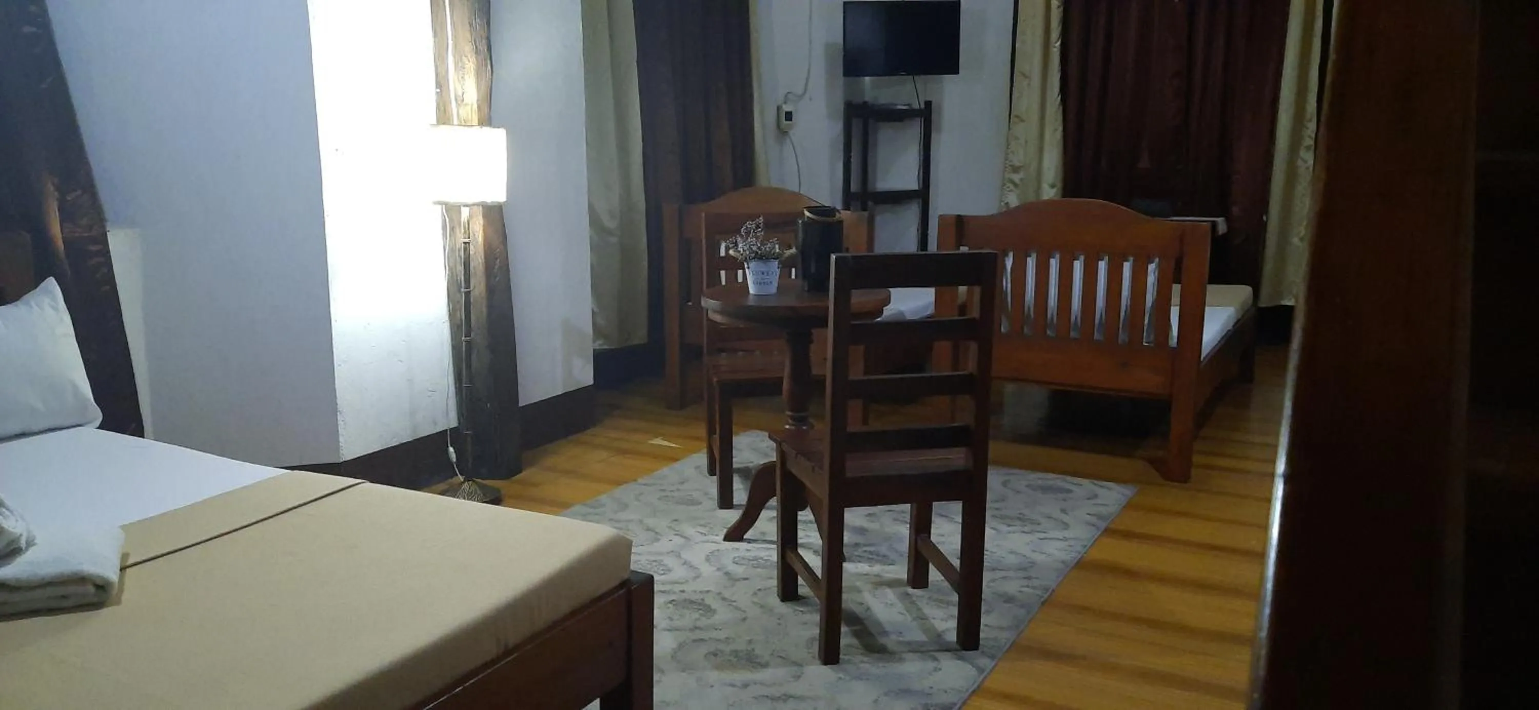 Bed in Escolta's Homey Lodge