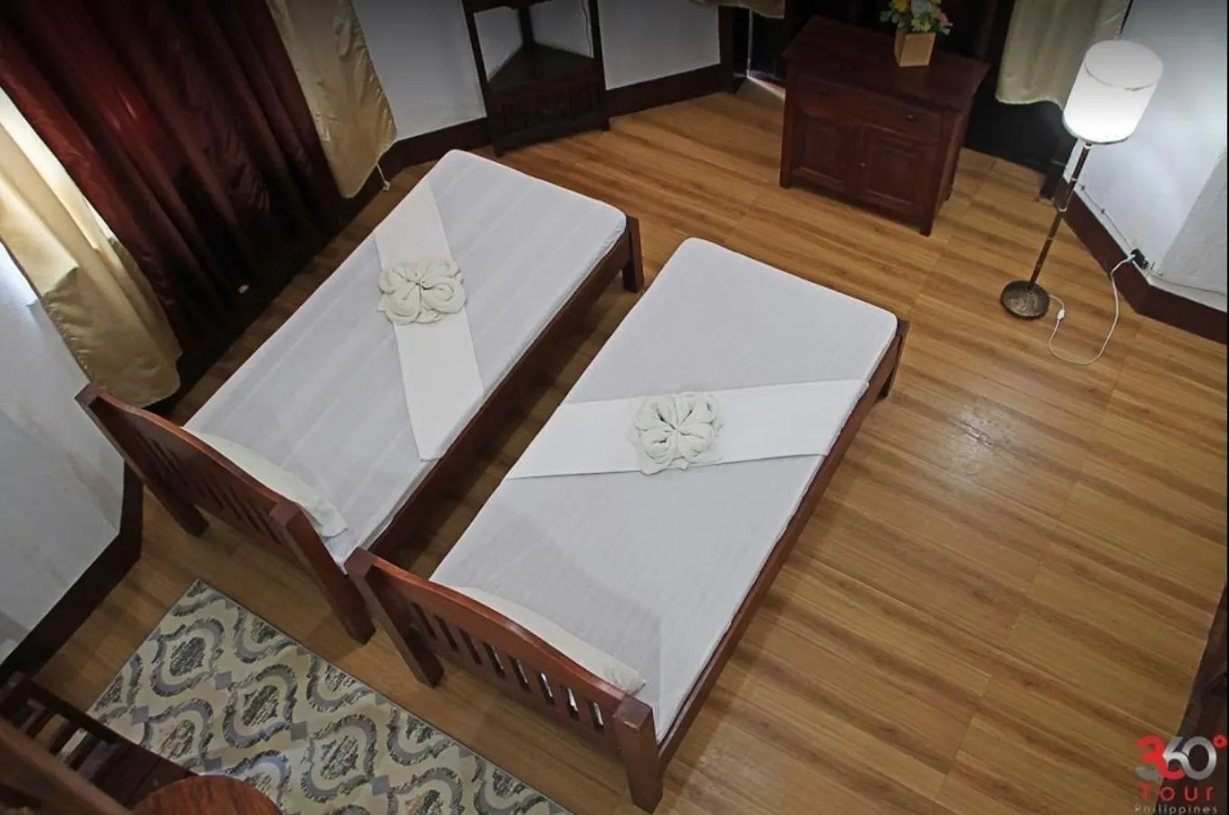 Bed in Escolta's Homey Lodge