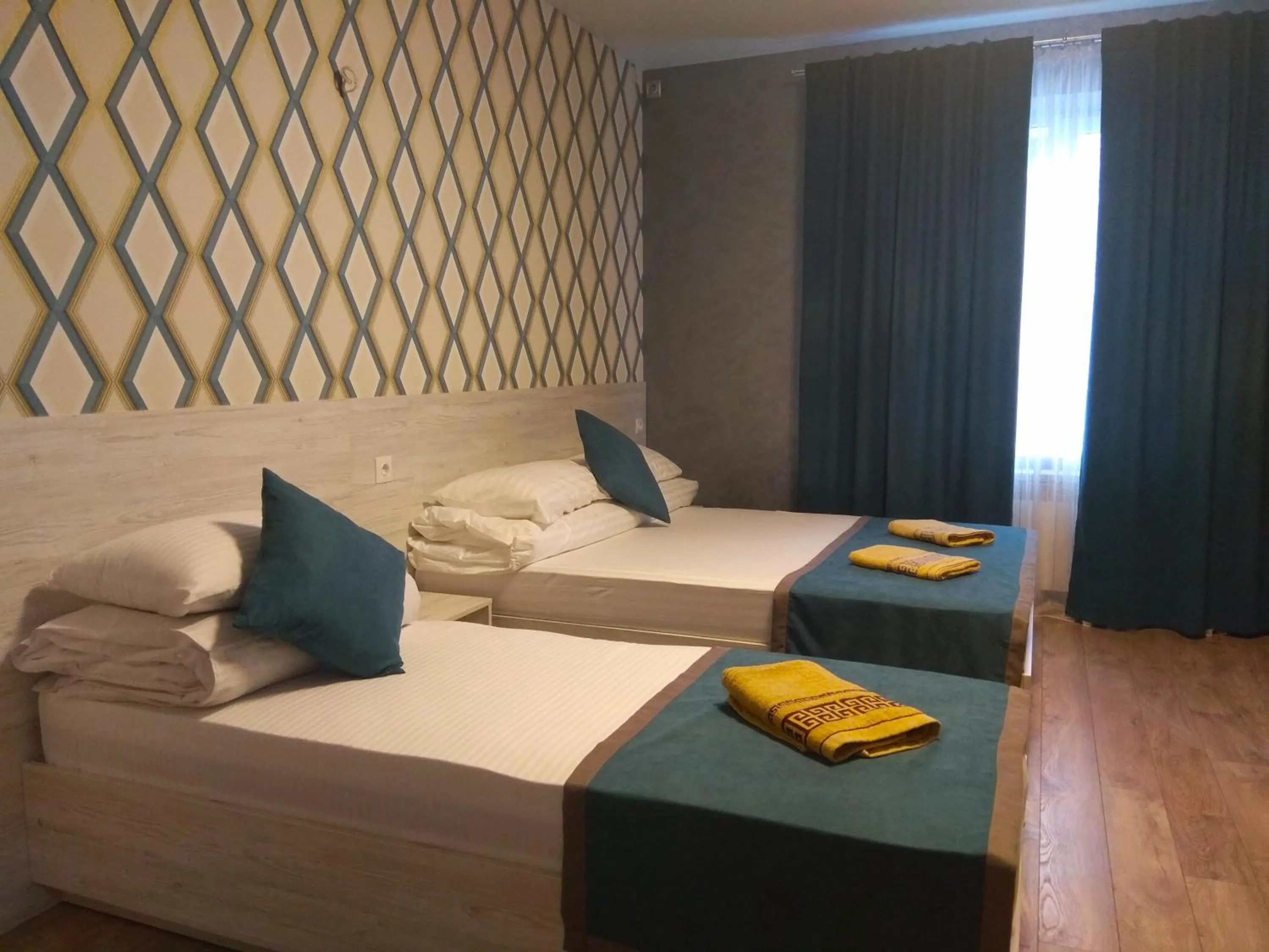 Comfort Triple Room with Shower in Rivne Hostel