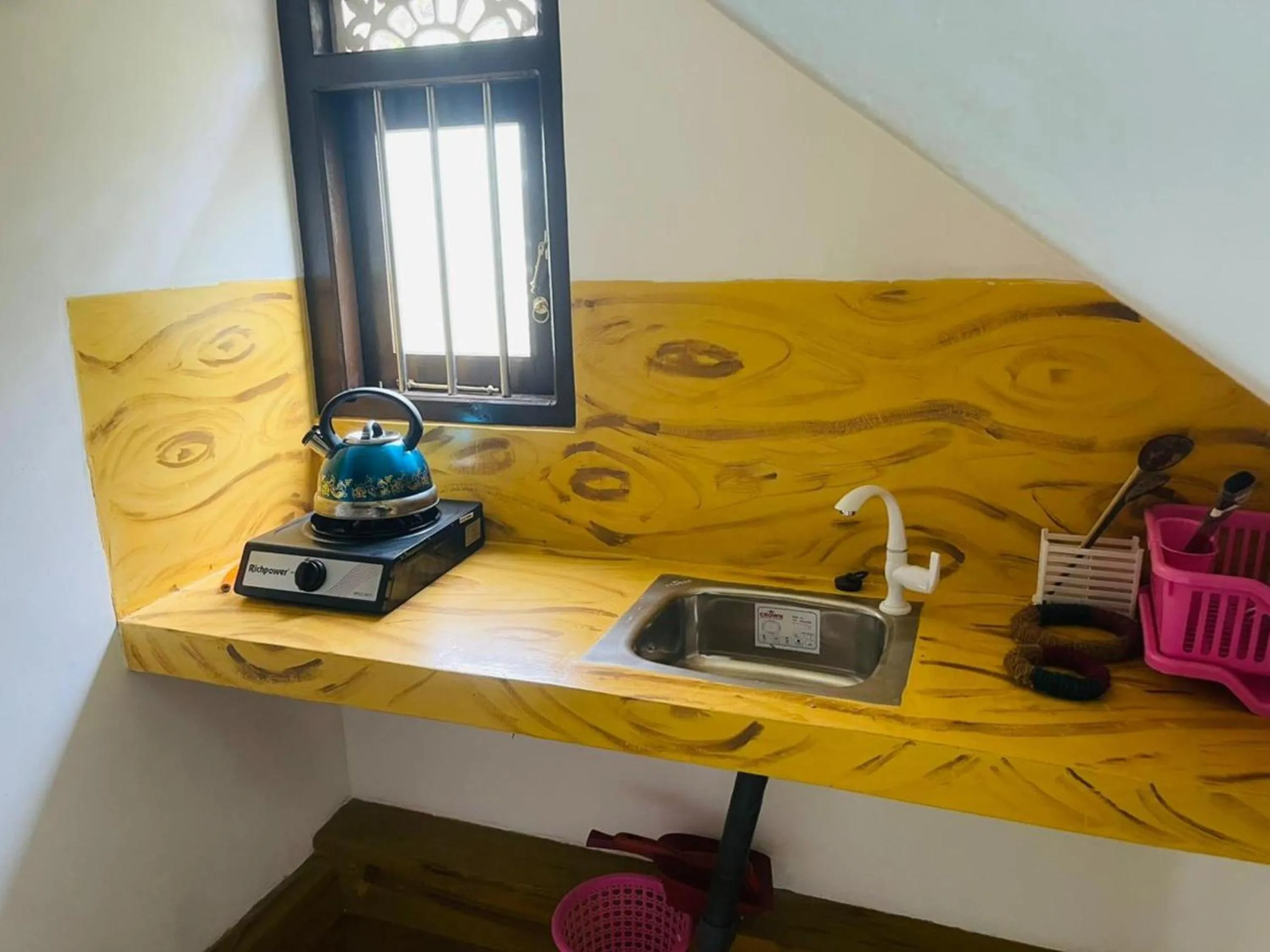 Kitchen or kitchenette in New Jaya Villa