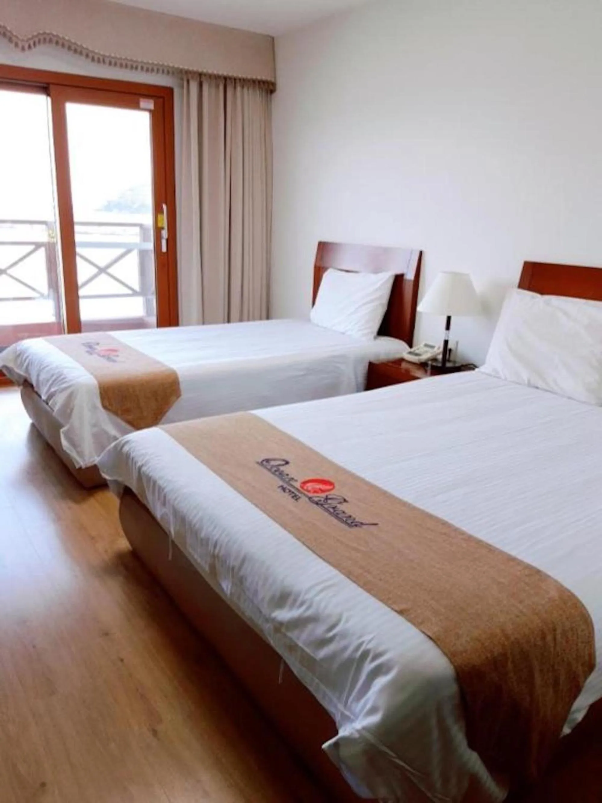 Bed in Ocean Grand Hotel