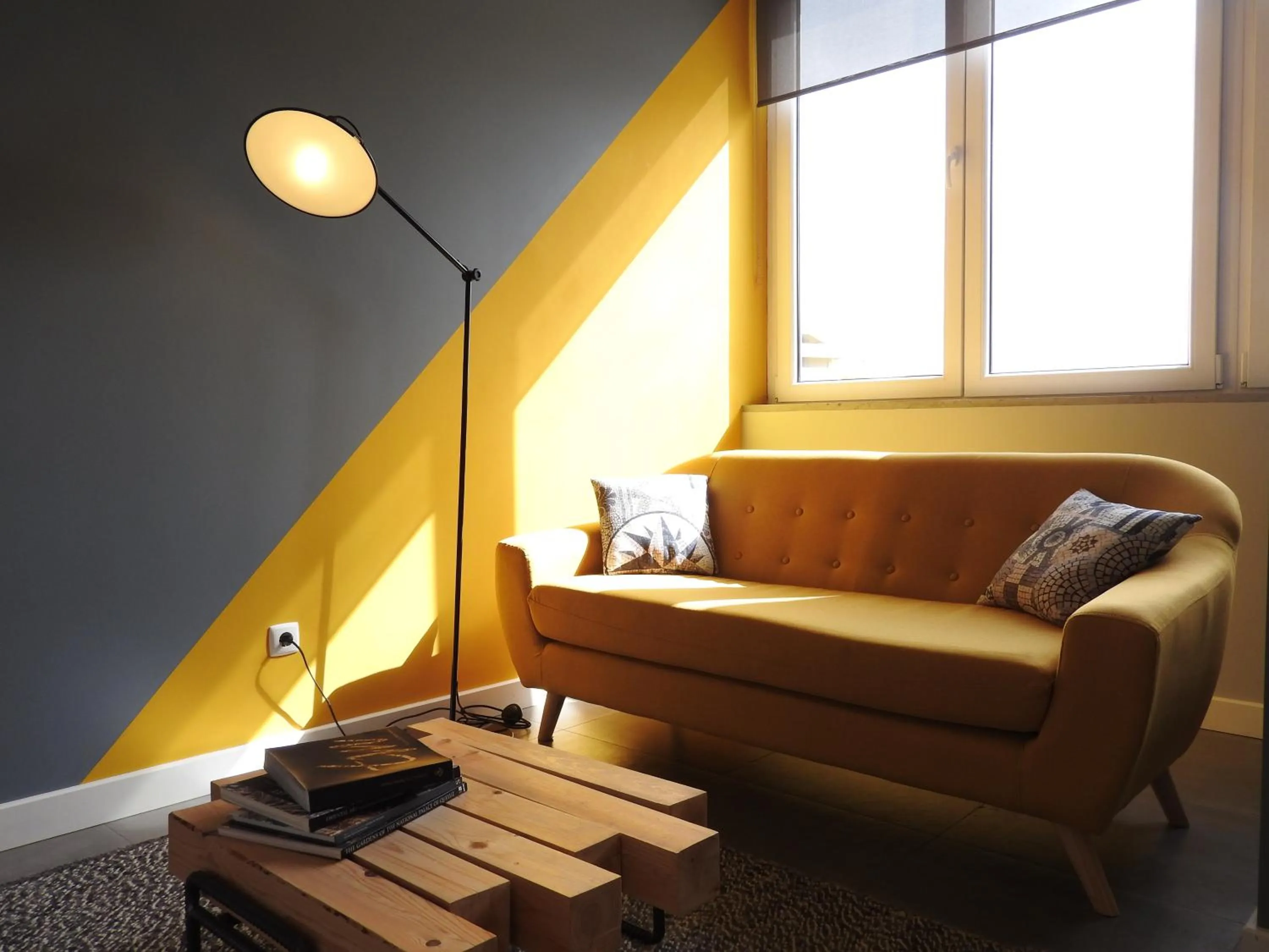 Communal lounge/ TV room in Lisbon Airport Hostel