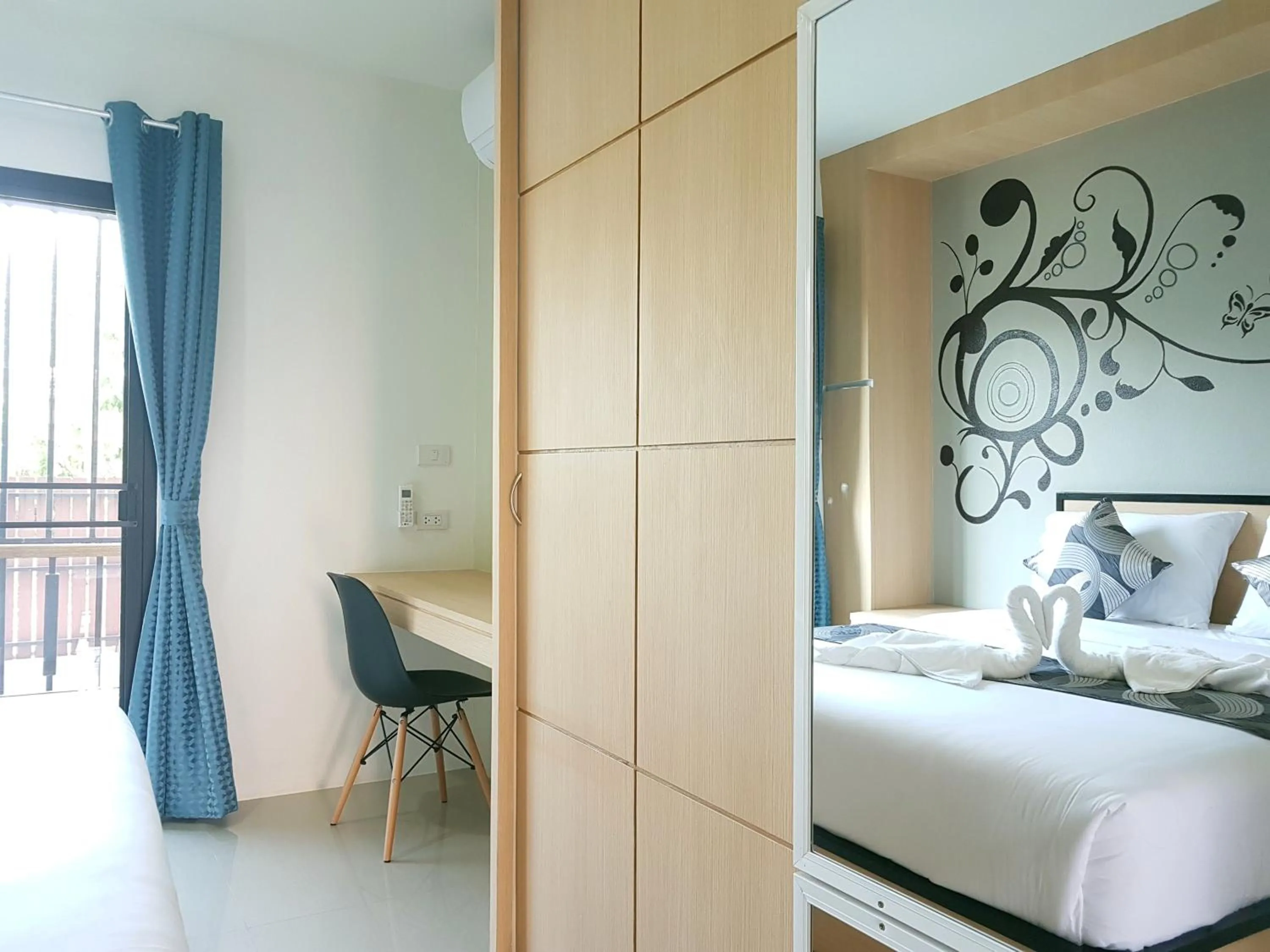 Bedroom, Bed in Sirimunta Hotel Chiang Rai Suite & Residence