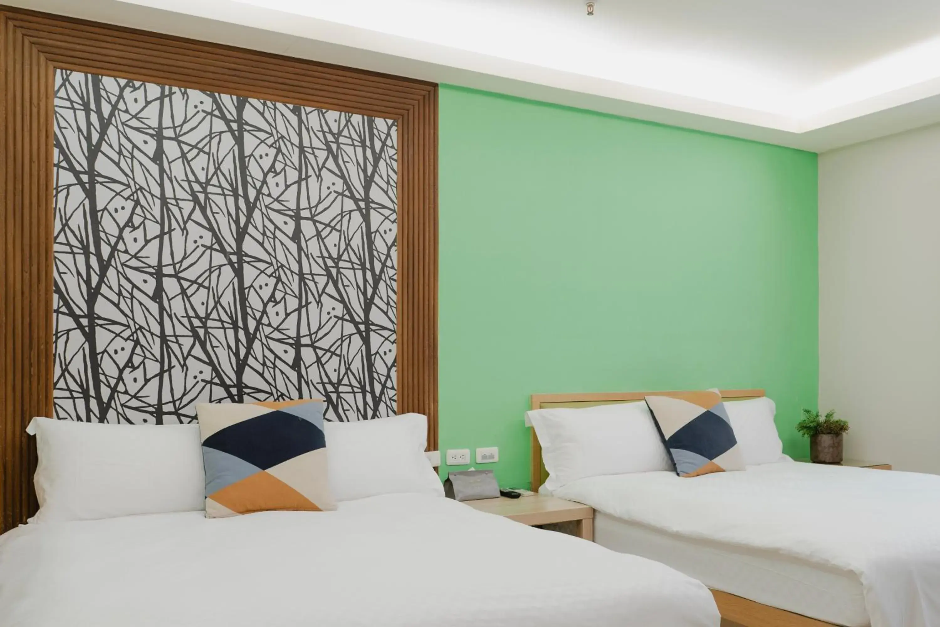 Bed in LJ Hotel Bed in LJ Hotel