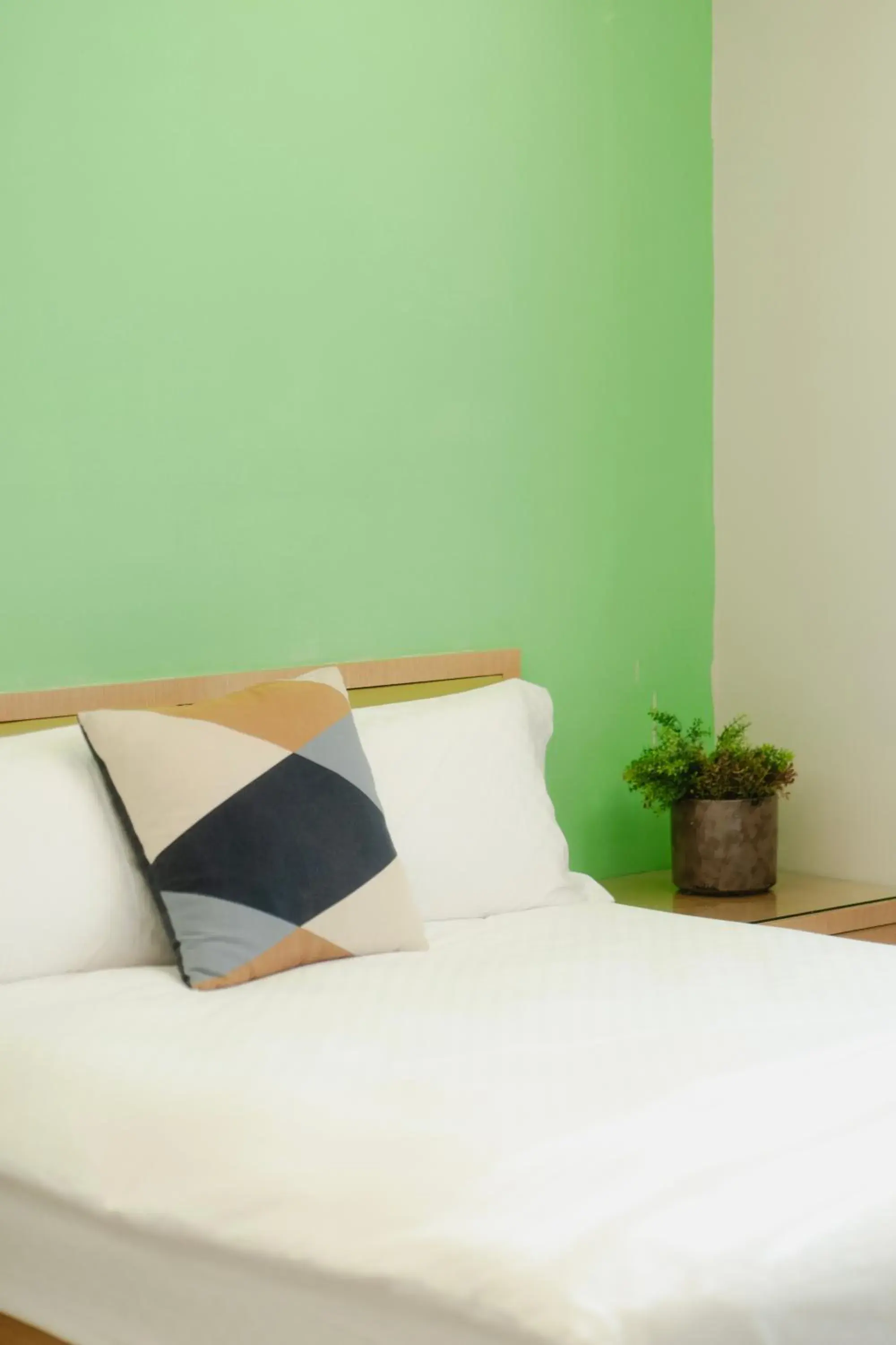 Bed in LJ Hotel Bed in LJ Hotel