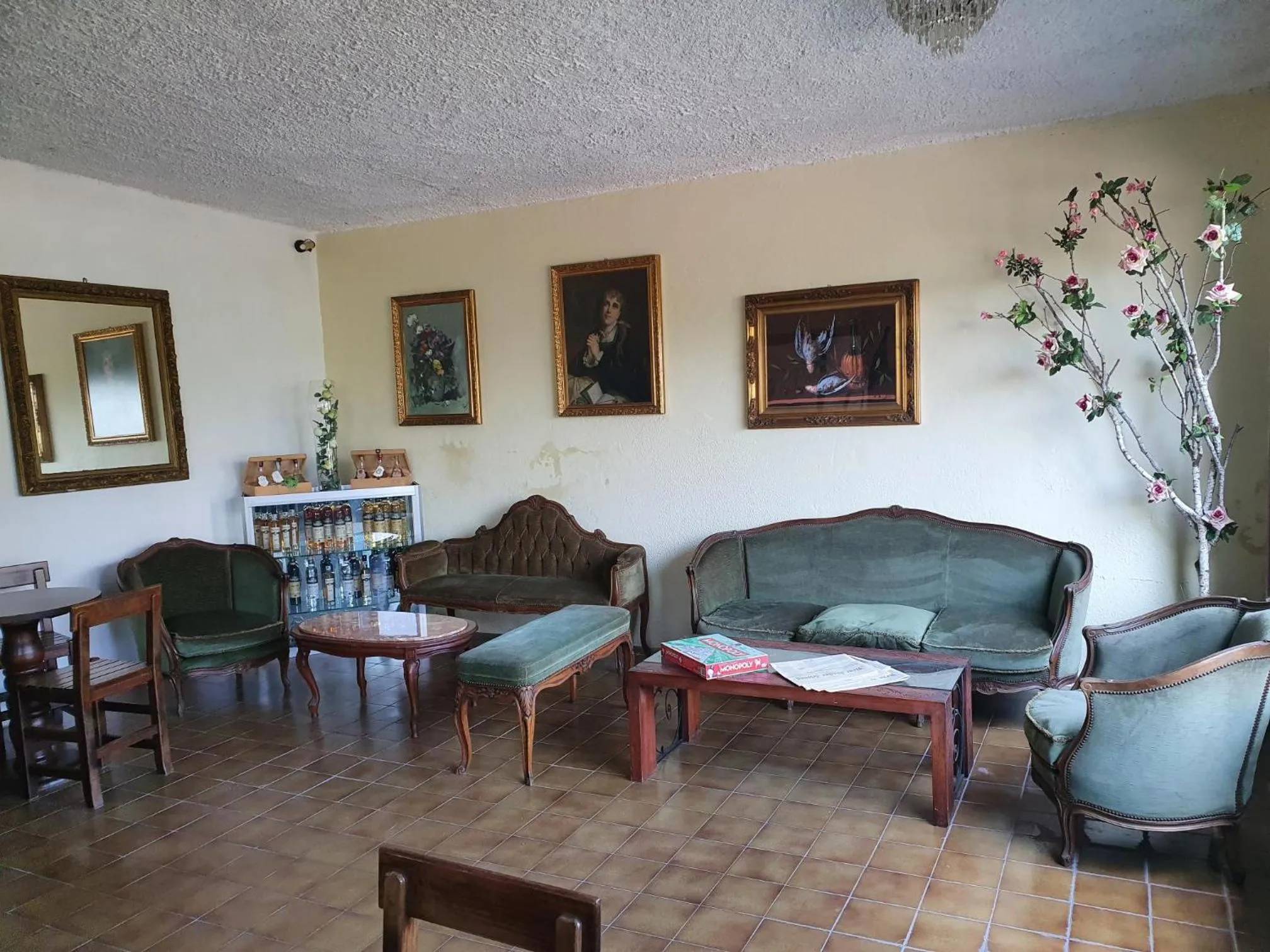 Communal lounge/ TV room in Hotel Madonna di Luciago