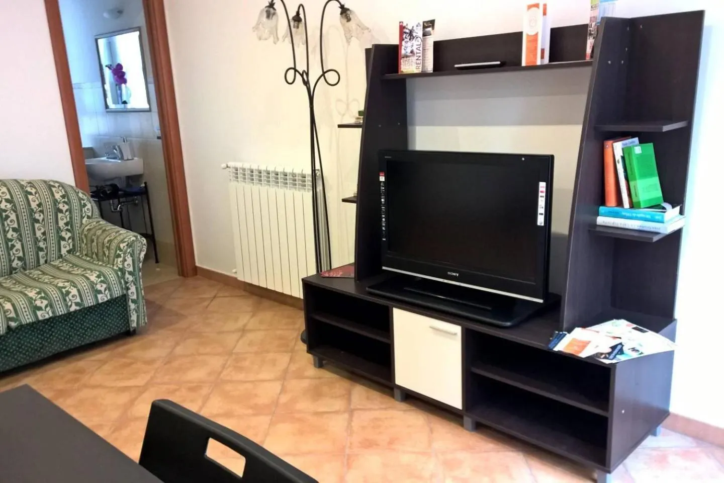 Communal lounge/ TV room in B&B Glicini