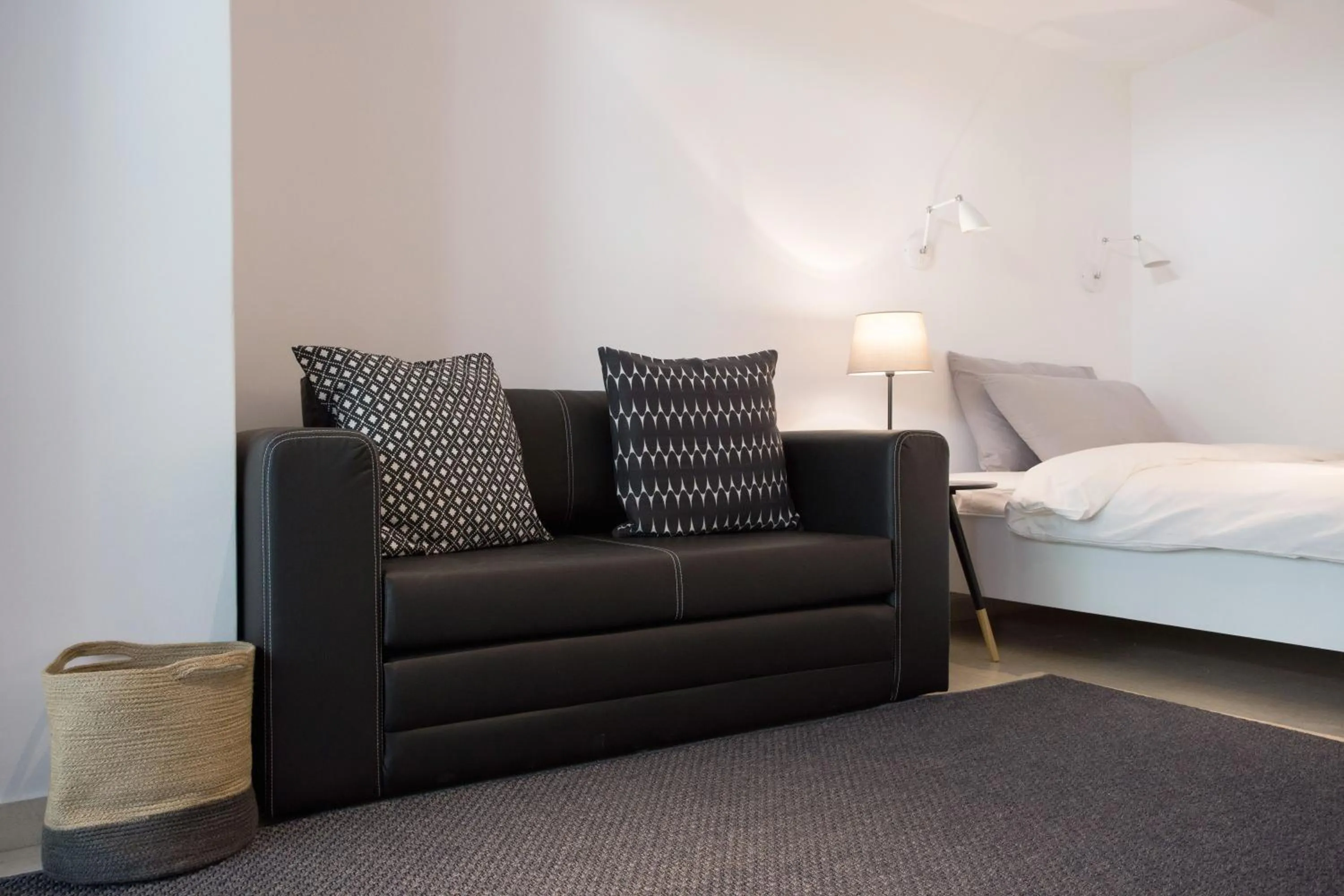Living room, Bed in Homz Studios Faliro