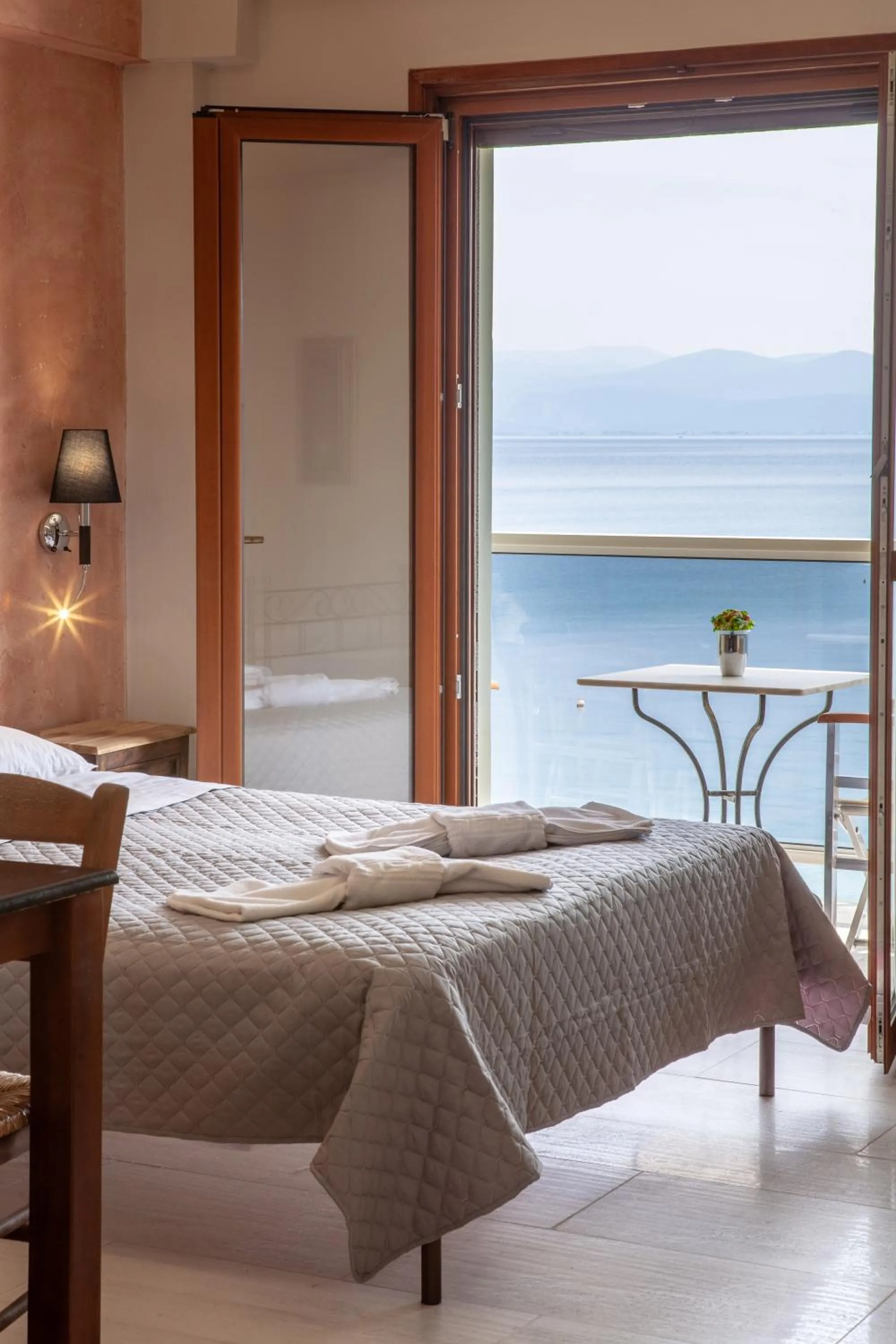 Bed in Mari Hotel & Maisonettes