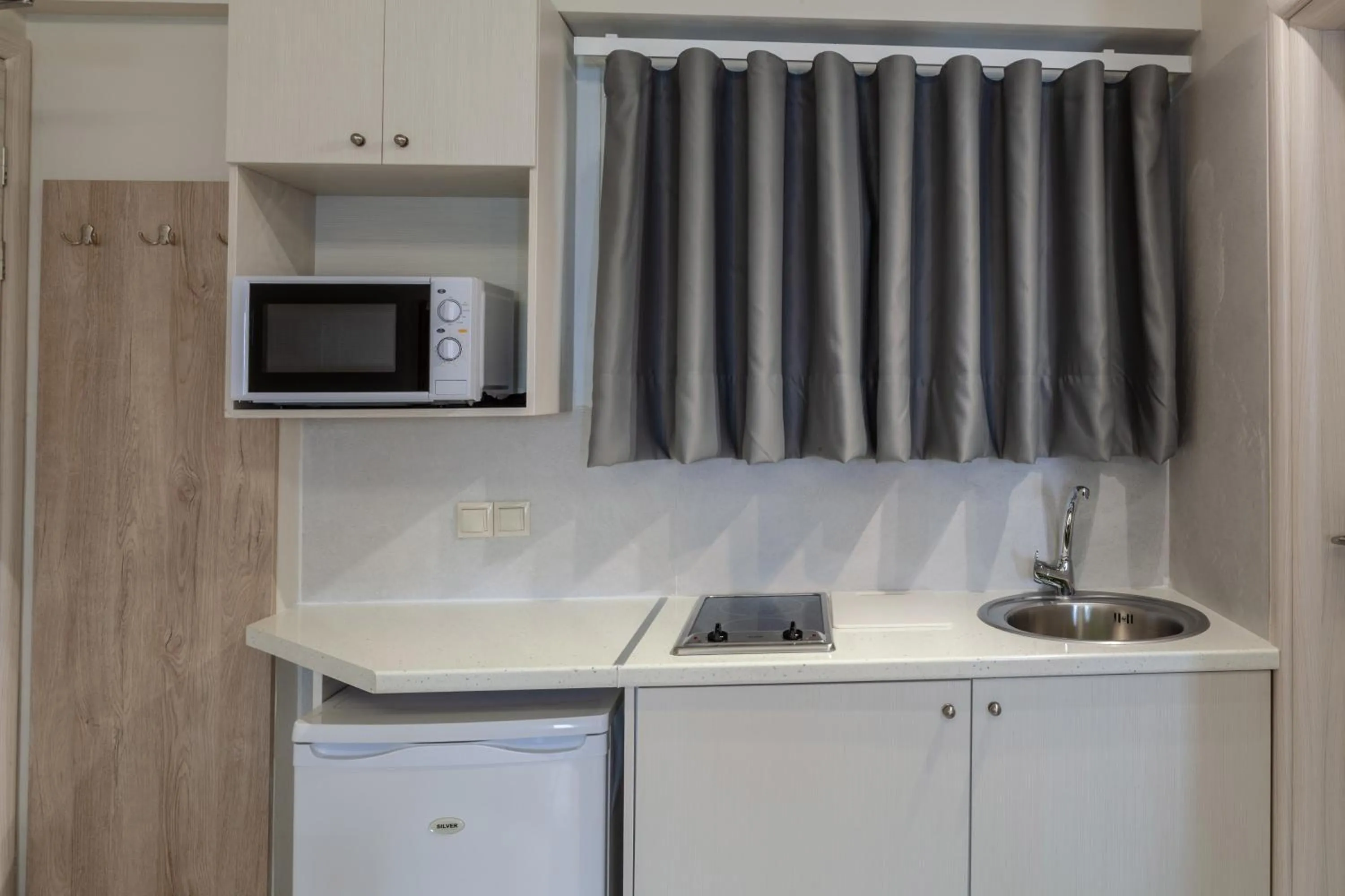 Kitchen or kitchenette in Mari Hotel & Maisonettes
