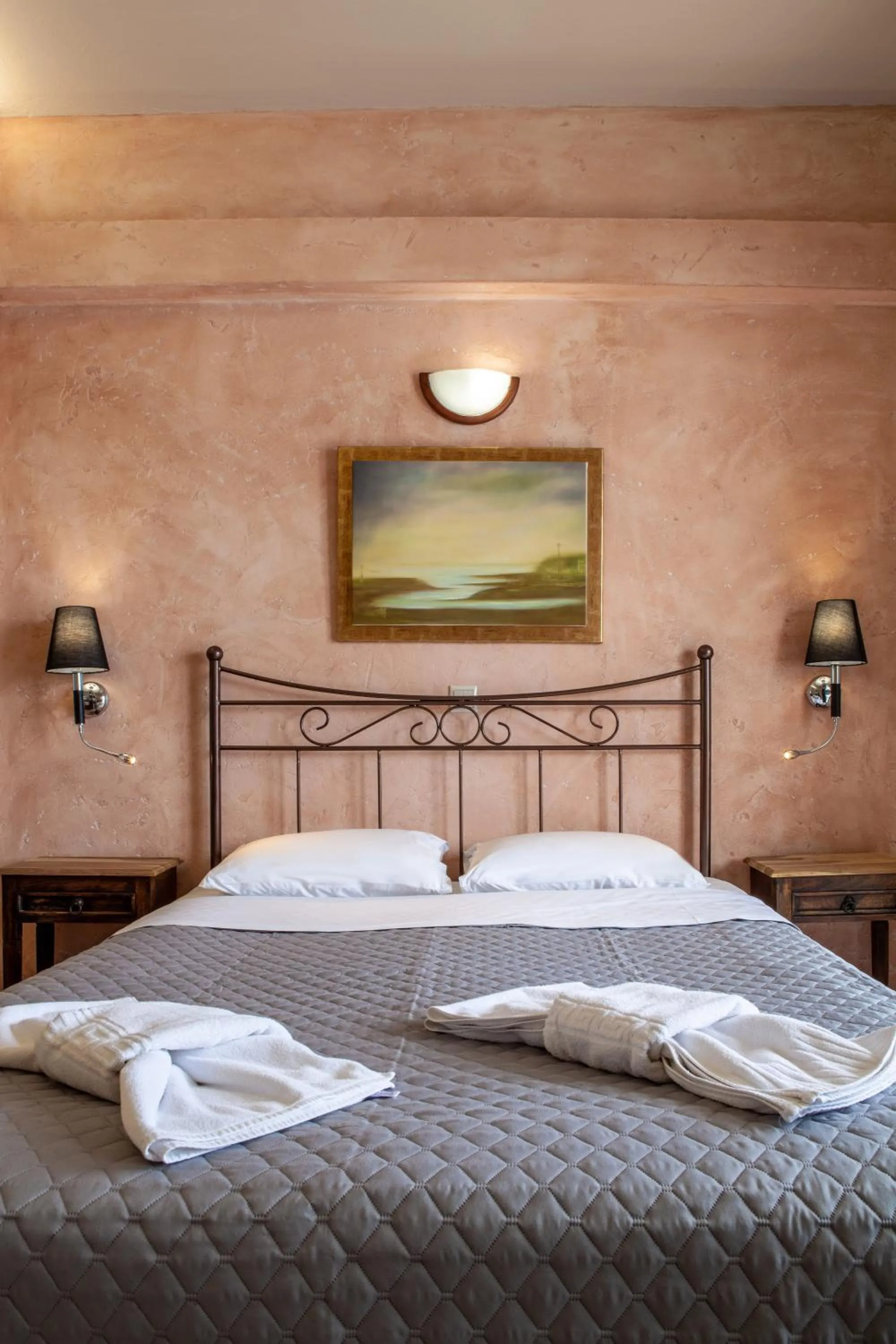 Bed in Mari Hotel & Maisonettes