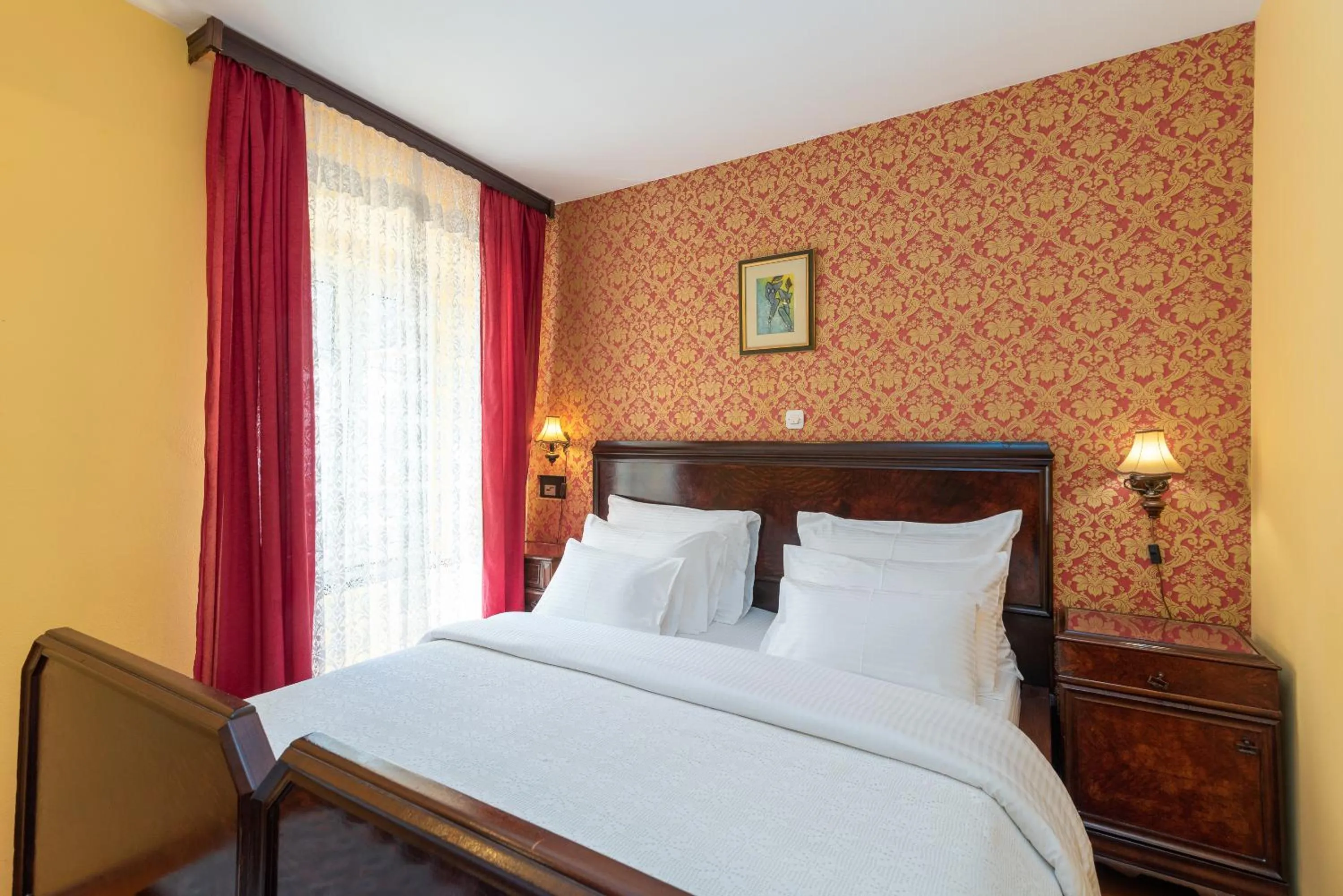 Bed in Heritage Hotel Pasike