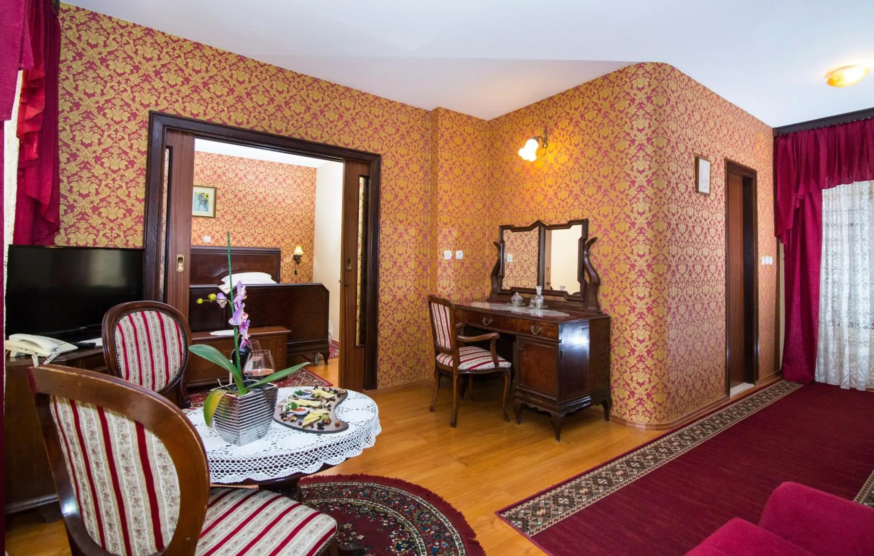 Communal lounge/ TV room, Bed in Heritage Hotel Pasike Communal lounge/ TV room, Bed in Heritage Hotel Pasike