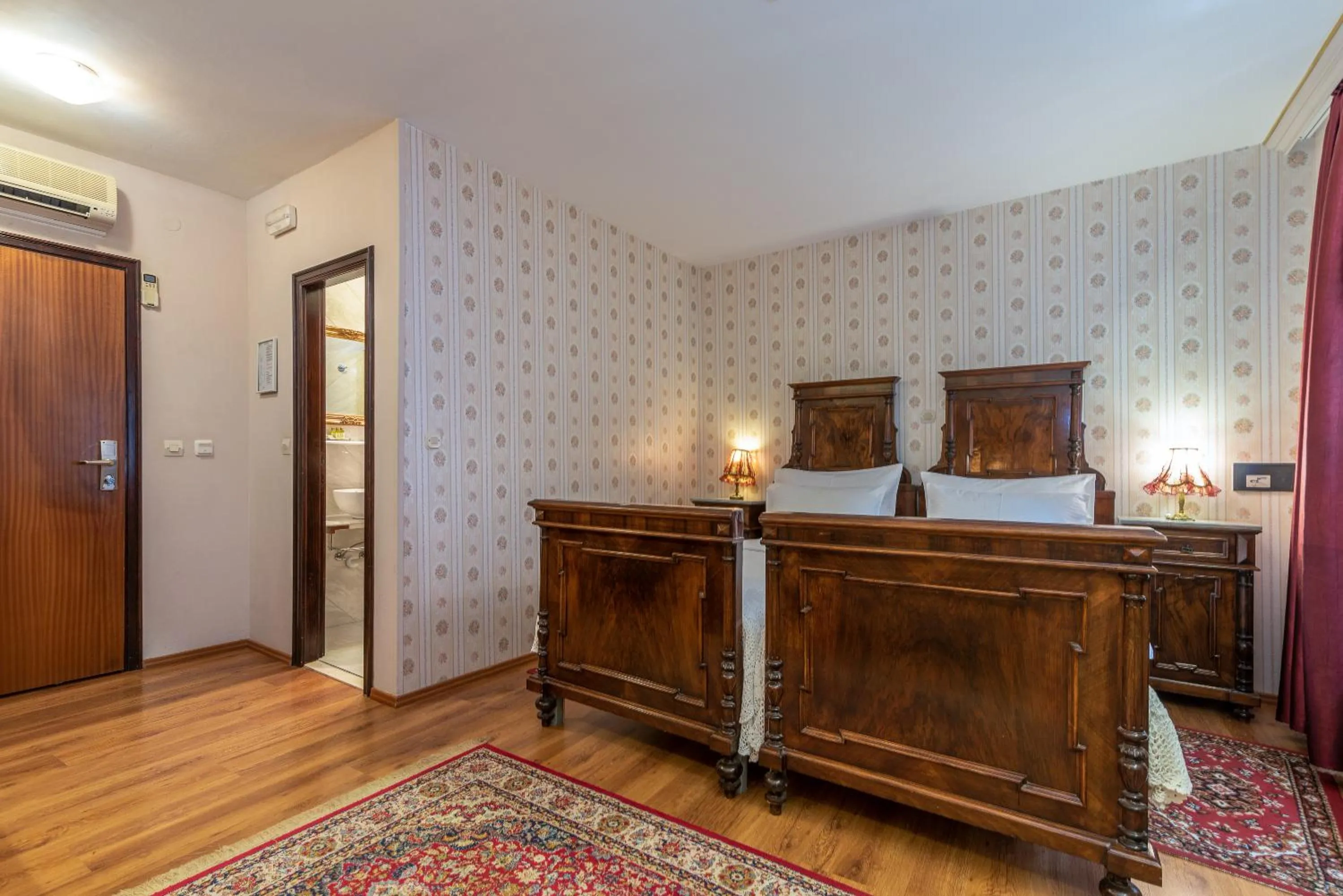 Bed in Heritage Hotel Pasike