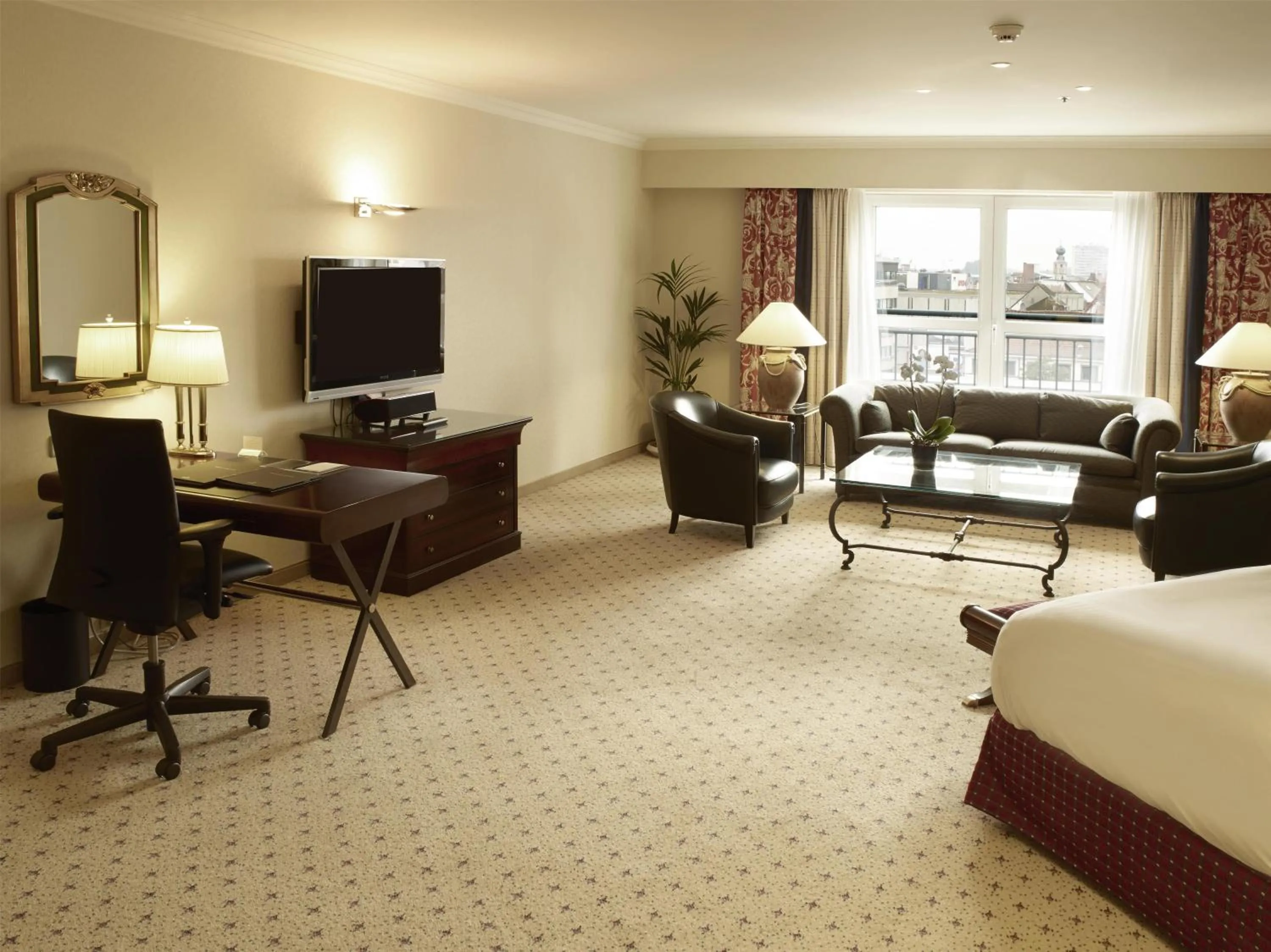 Living room, Bed in Hilton Antwerp Old Town