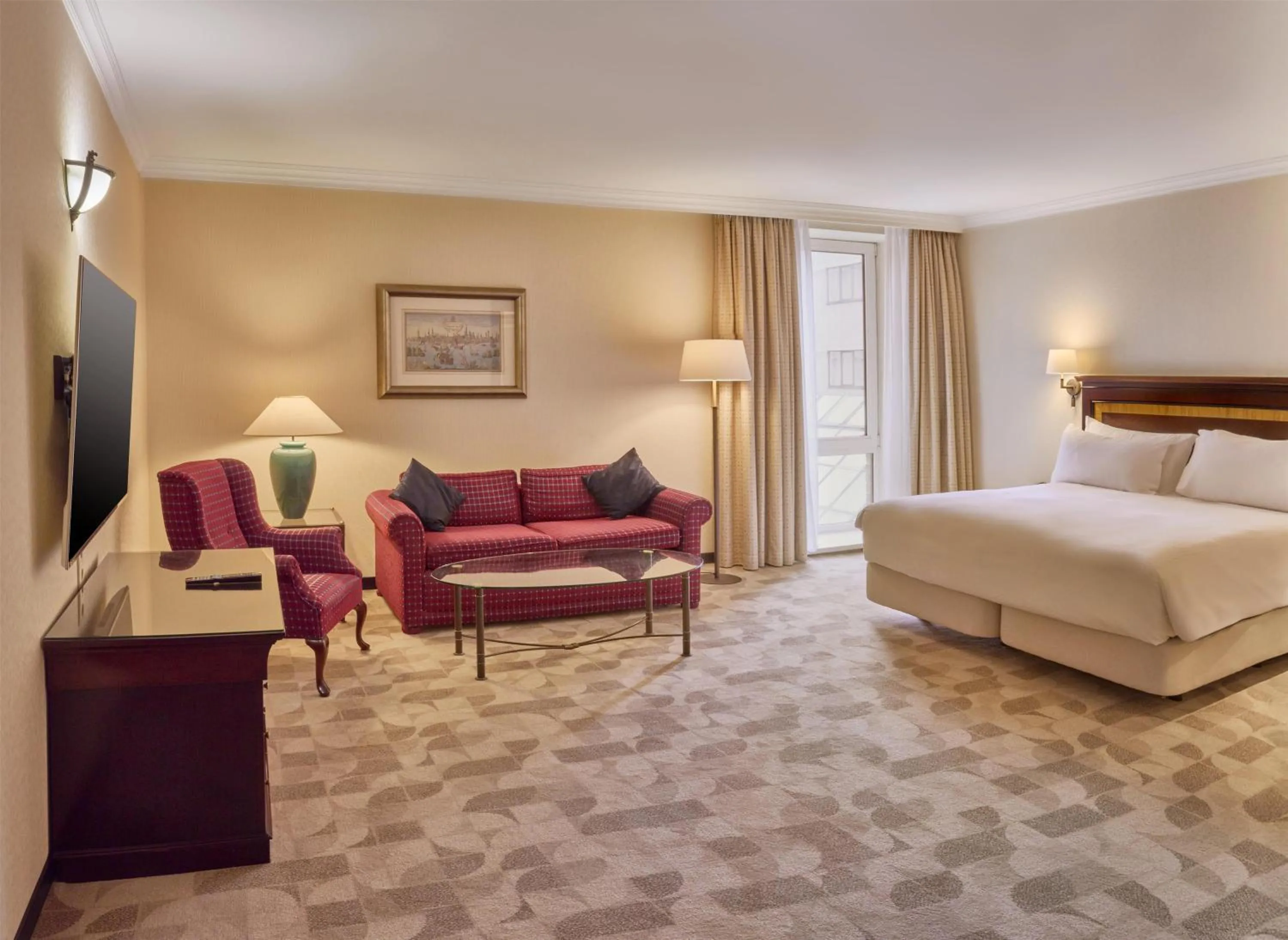 Living room, Bed in Hilton Antwerp Old Town