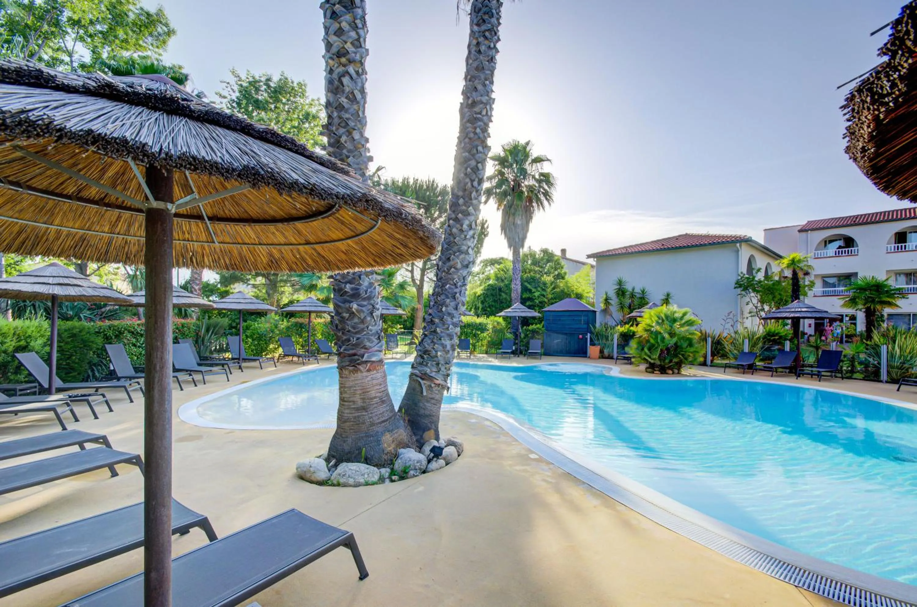 Swimming pool in Le Cottage - Hotel & Spa