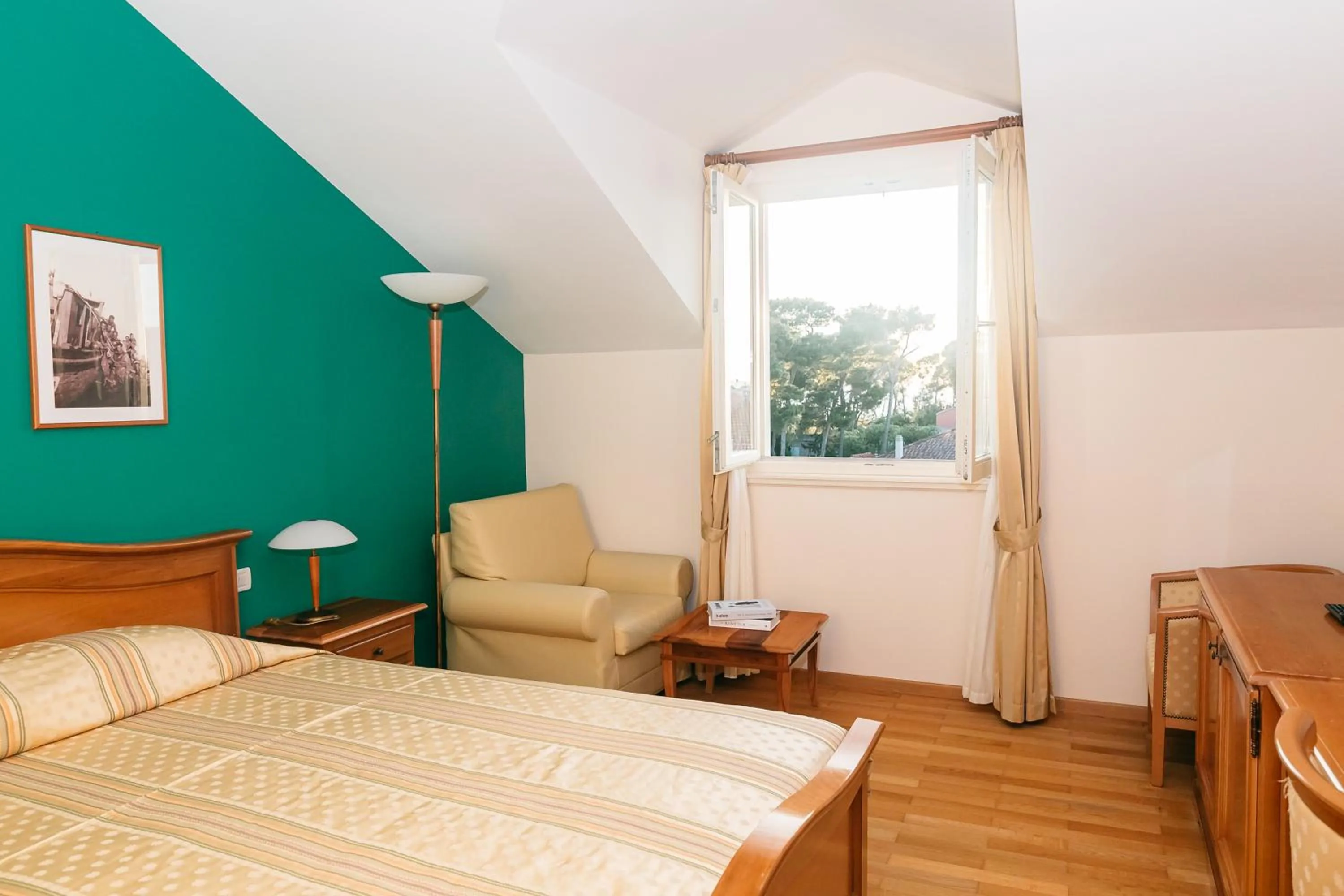 Bed in Hotel Spongiola