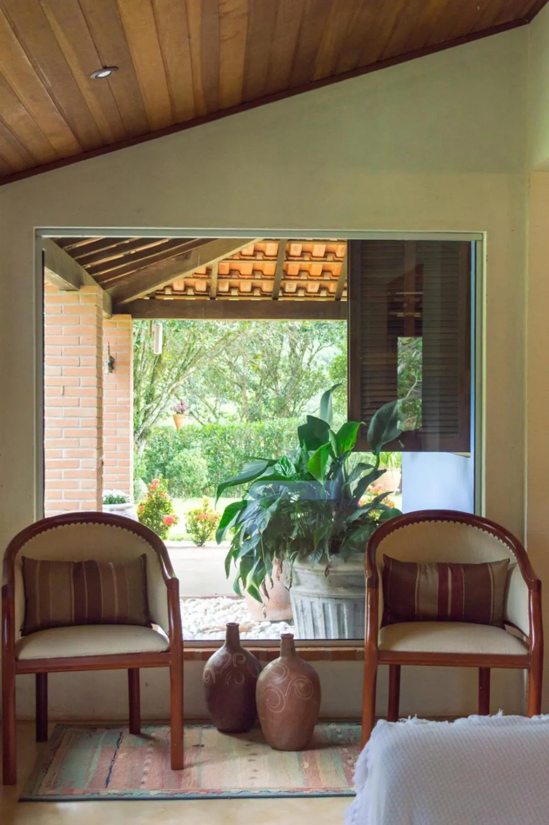 Living room, Bed in Pousada Quintal da Prosa