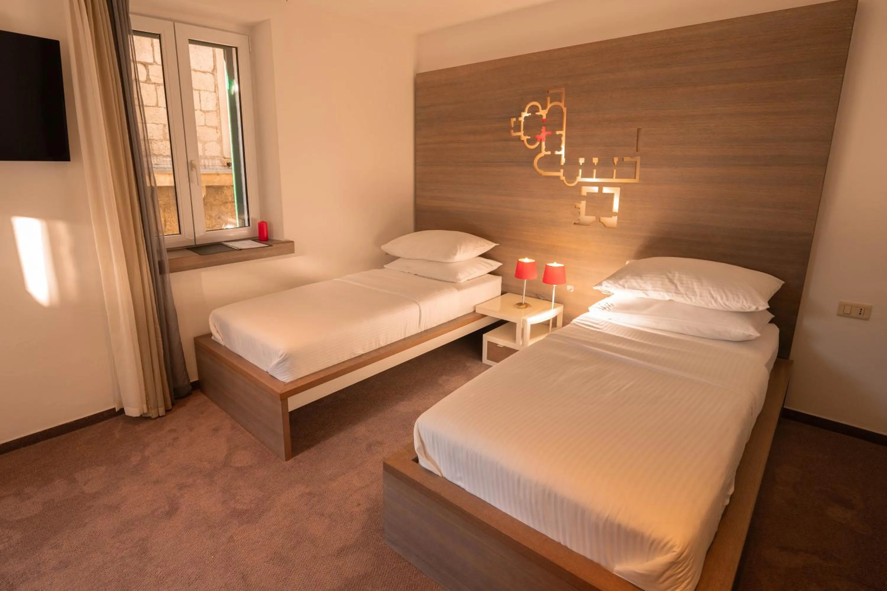 Bed in Slavija Culture Heritage Hotel