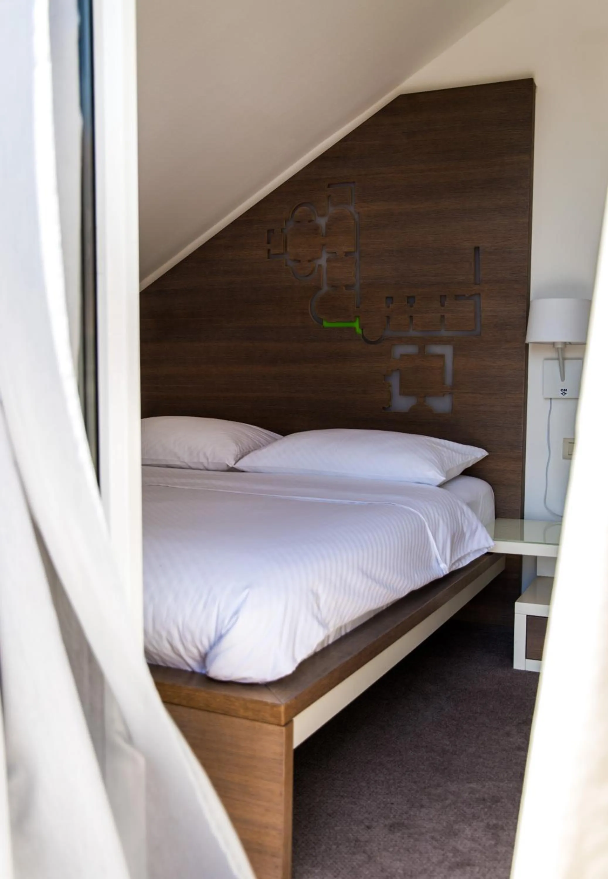 Bed in Slavija Culture Heritage Hotel