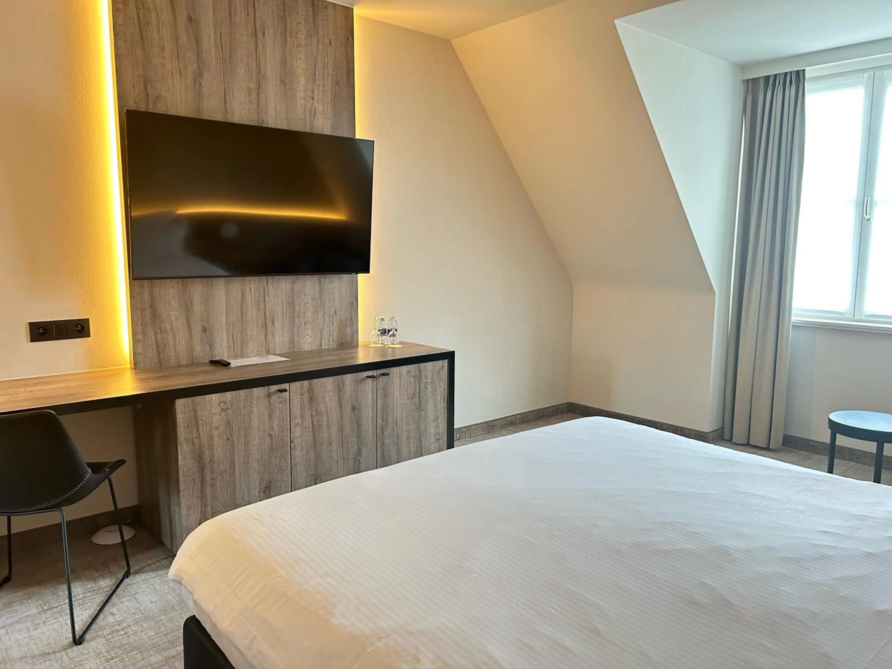 Bed in Hotel Restaurant Weinebrugge