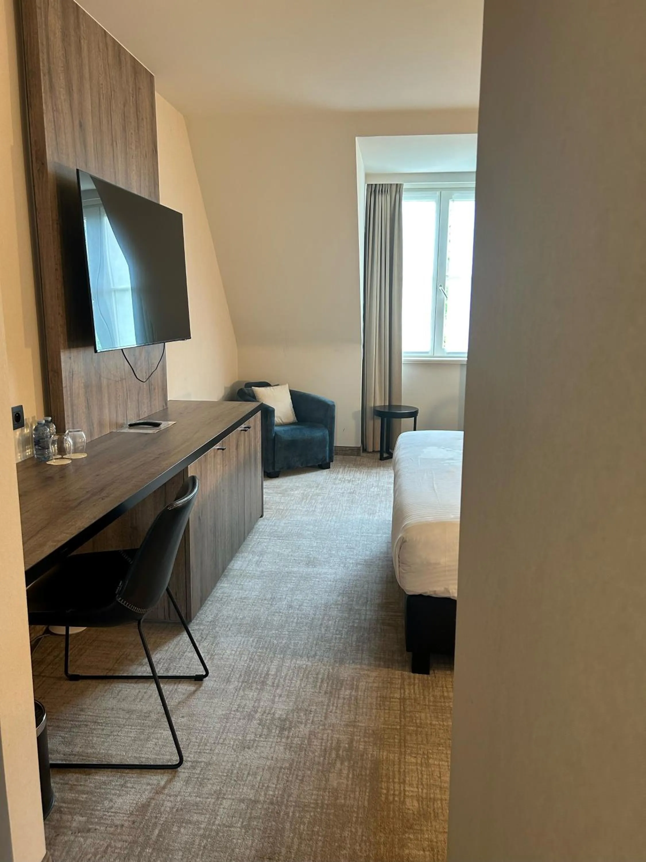 Bed in Hotel Restaurant Weinebrugge