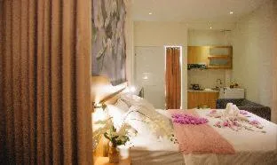 Bed in Deva Bali Apartement