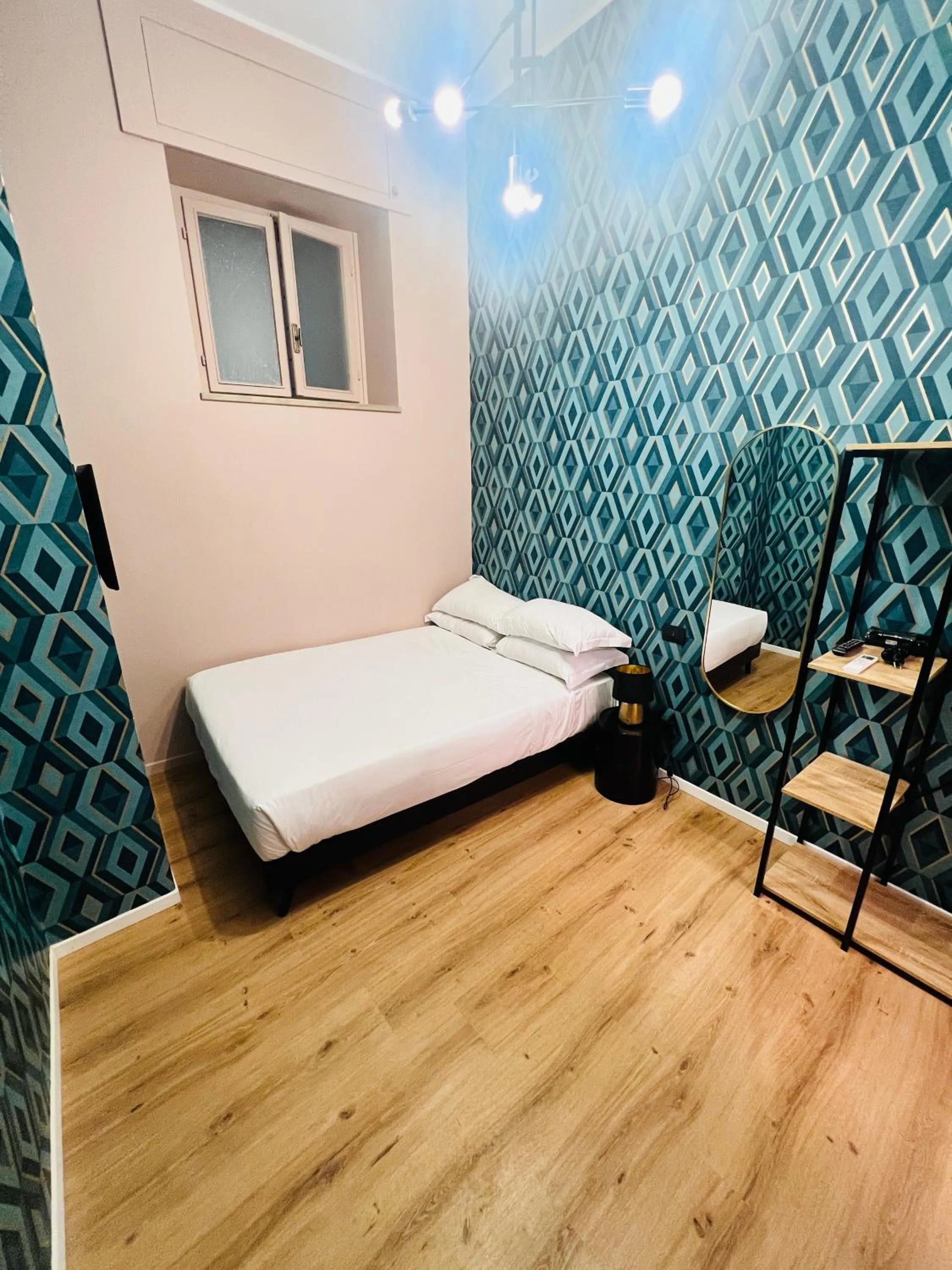 Bed in Room Verona Ai Conti