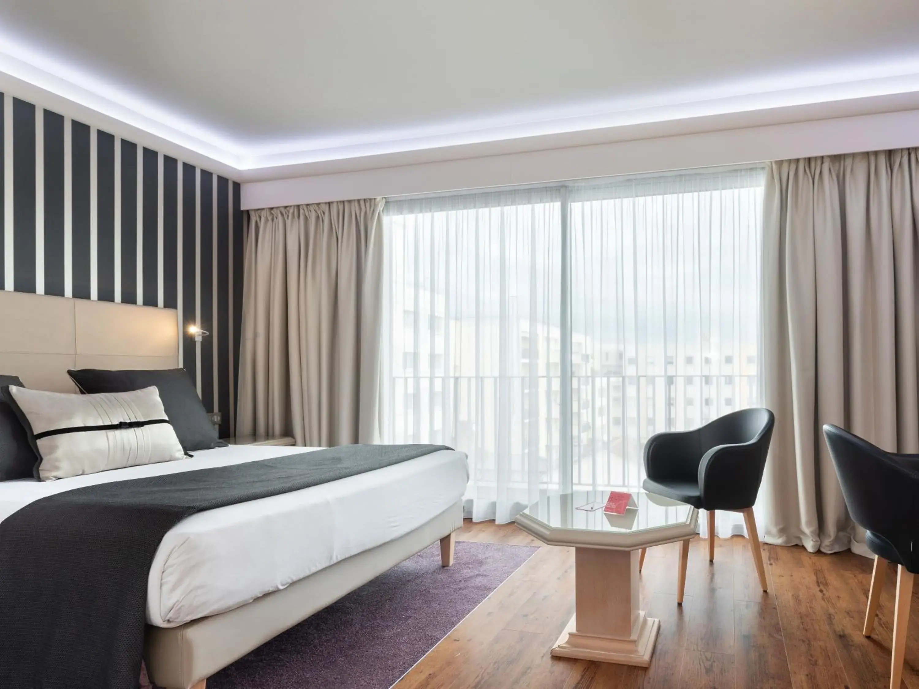 Bedroom, Bed in Hôtel Charlemagne by Happyculture Bedroom, Bed in Hôtel Charlemagne by Happyculture