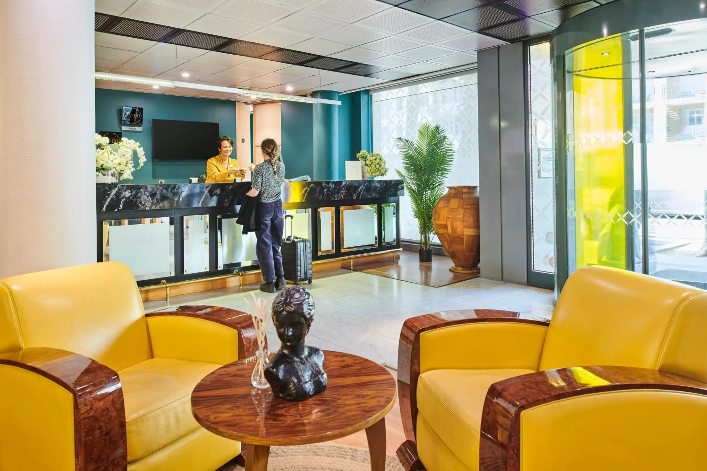 Lobby or reception in Hôtel Charlemagne by Happyculture Lobby or reception in Hôtel Charlemagne by Happyculture