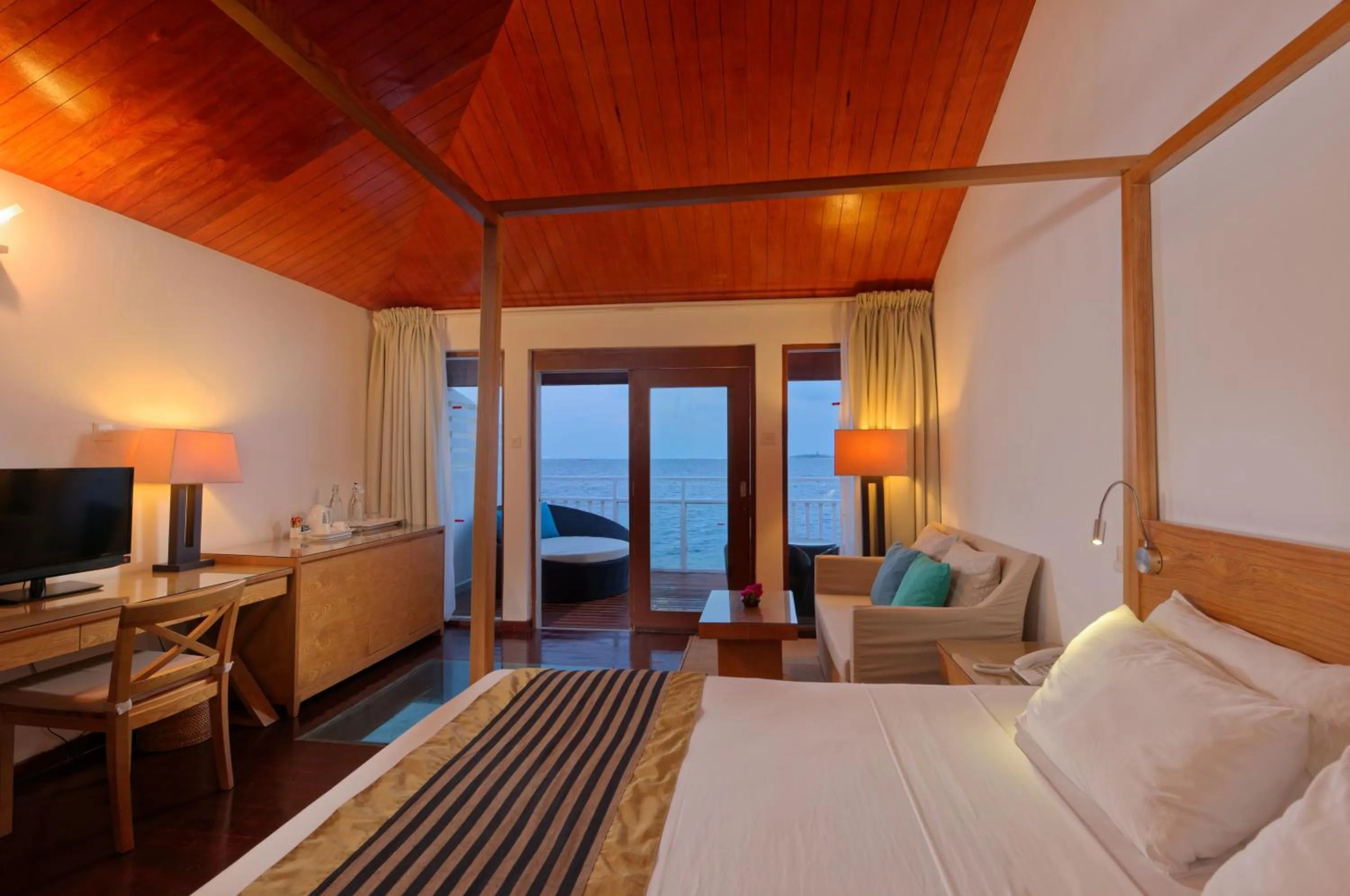 Photo of the whole room, Bed in Embudu Village Maldives